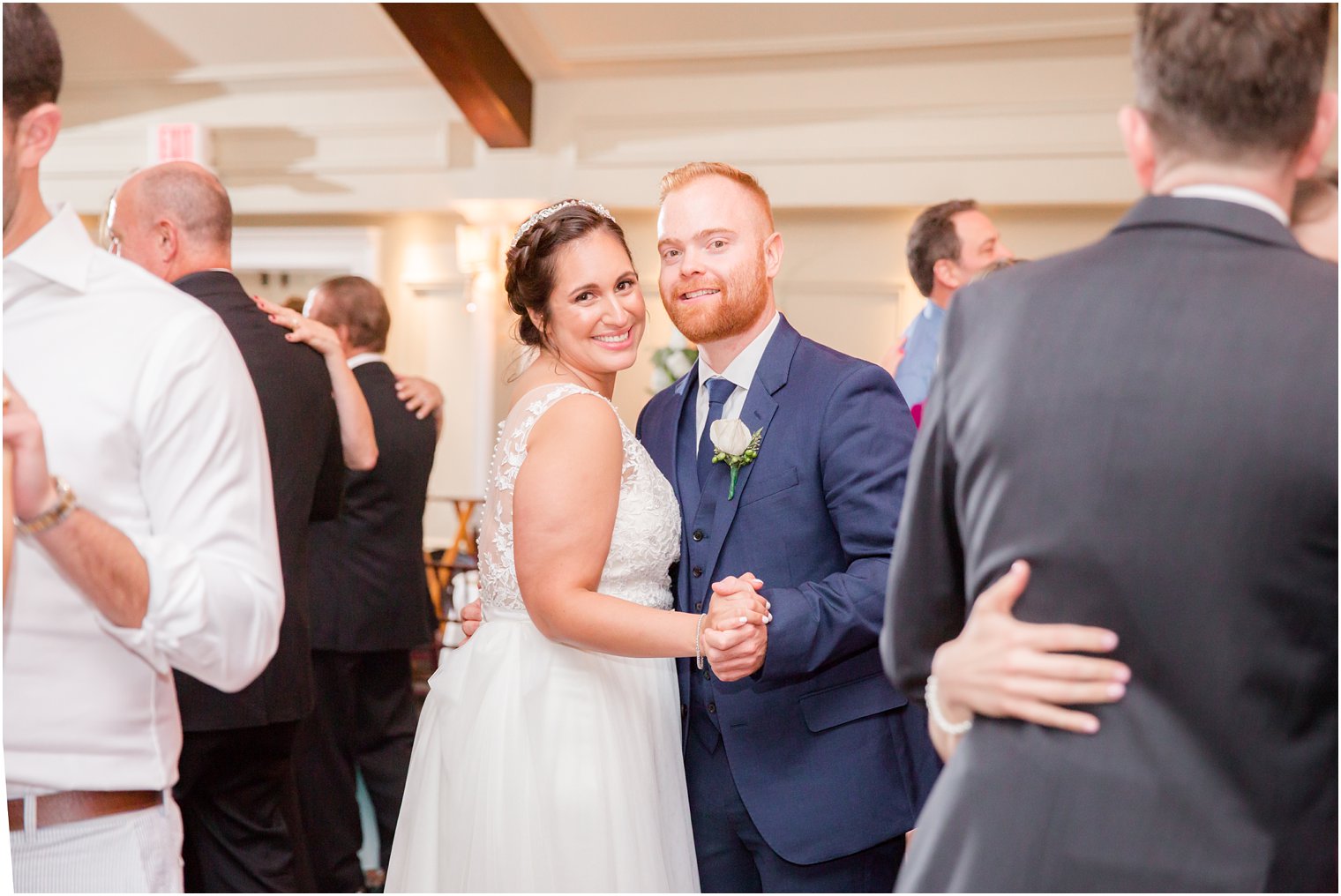 bride and groom dance during reception photographed by Idalia Photography