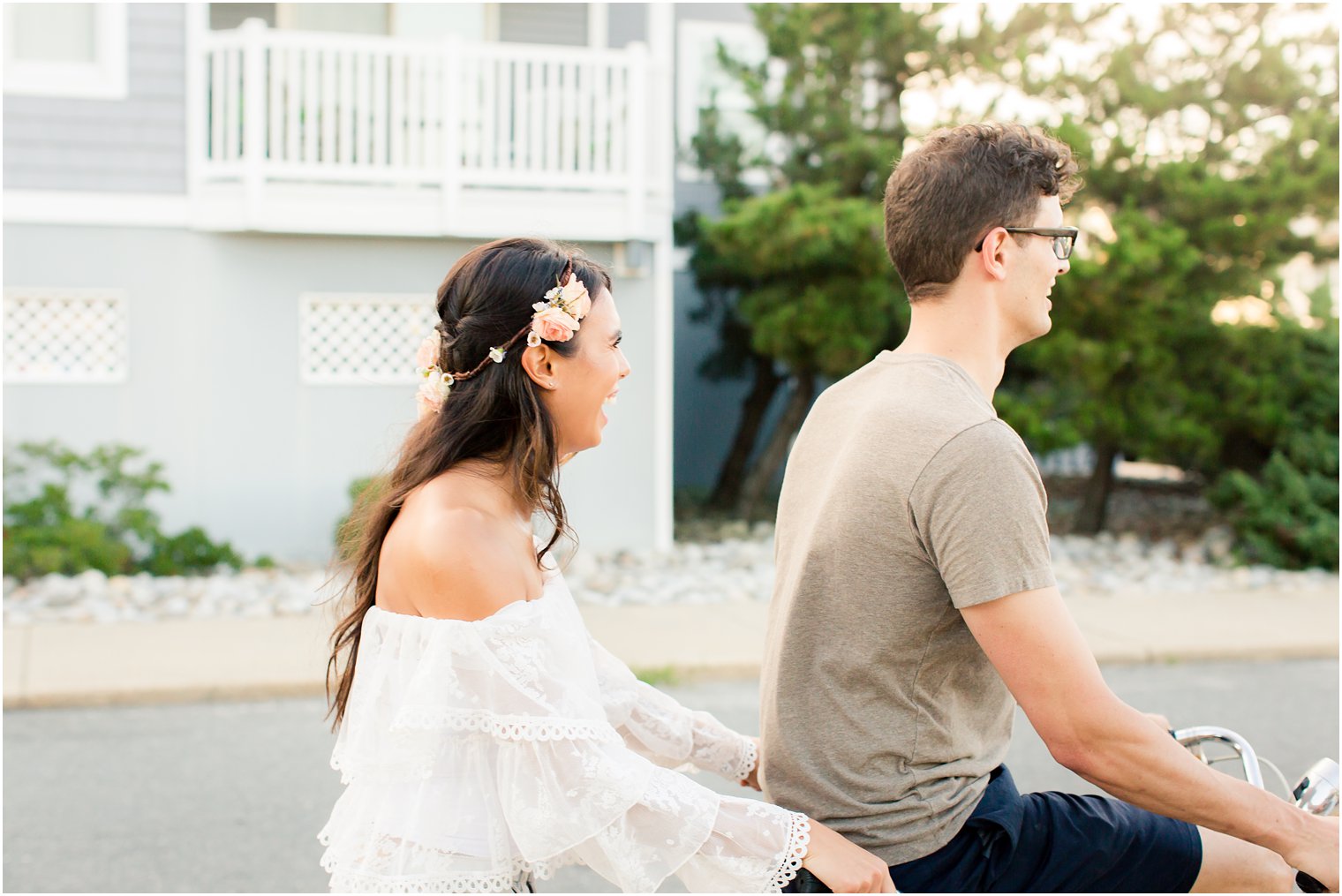 bride wears flower crown during Long Beach Island engagement session with Idalia Photography