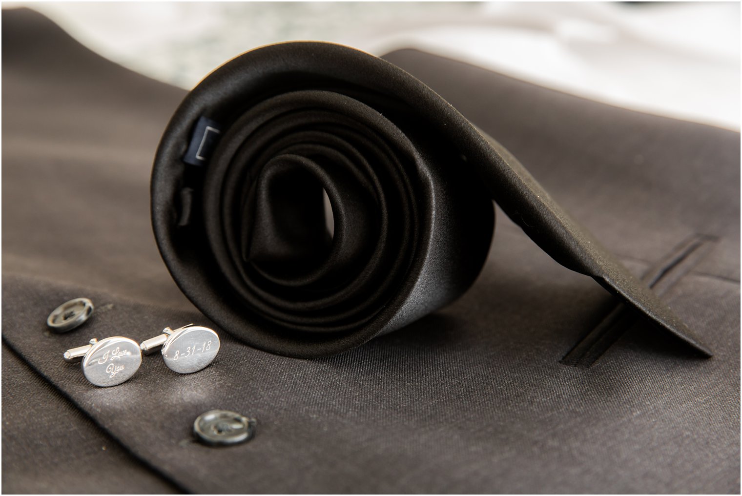 groom's tie and cufflinks photographed by Idalia Photography