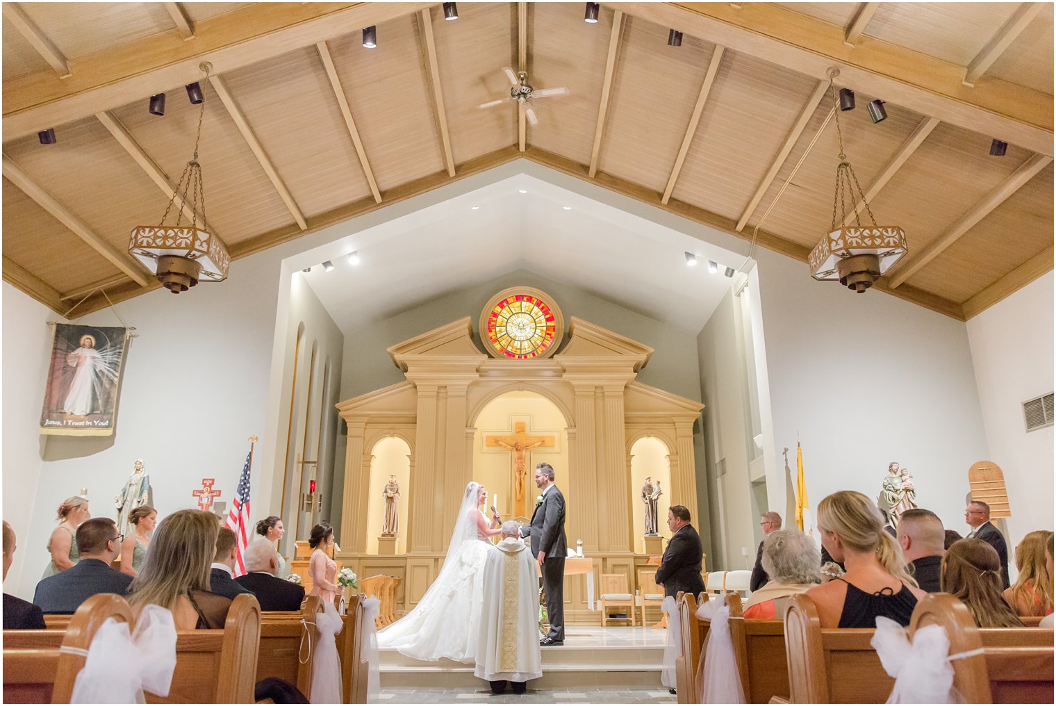 bride and groom exchange vows in North Jersey wedding ceremony by Idalia Photography