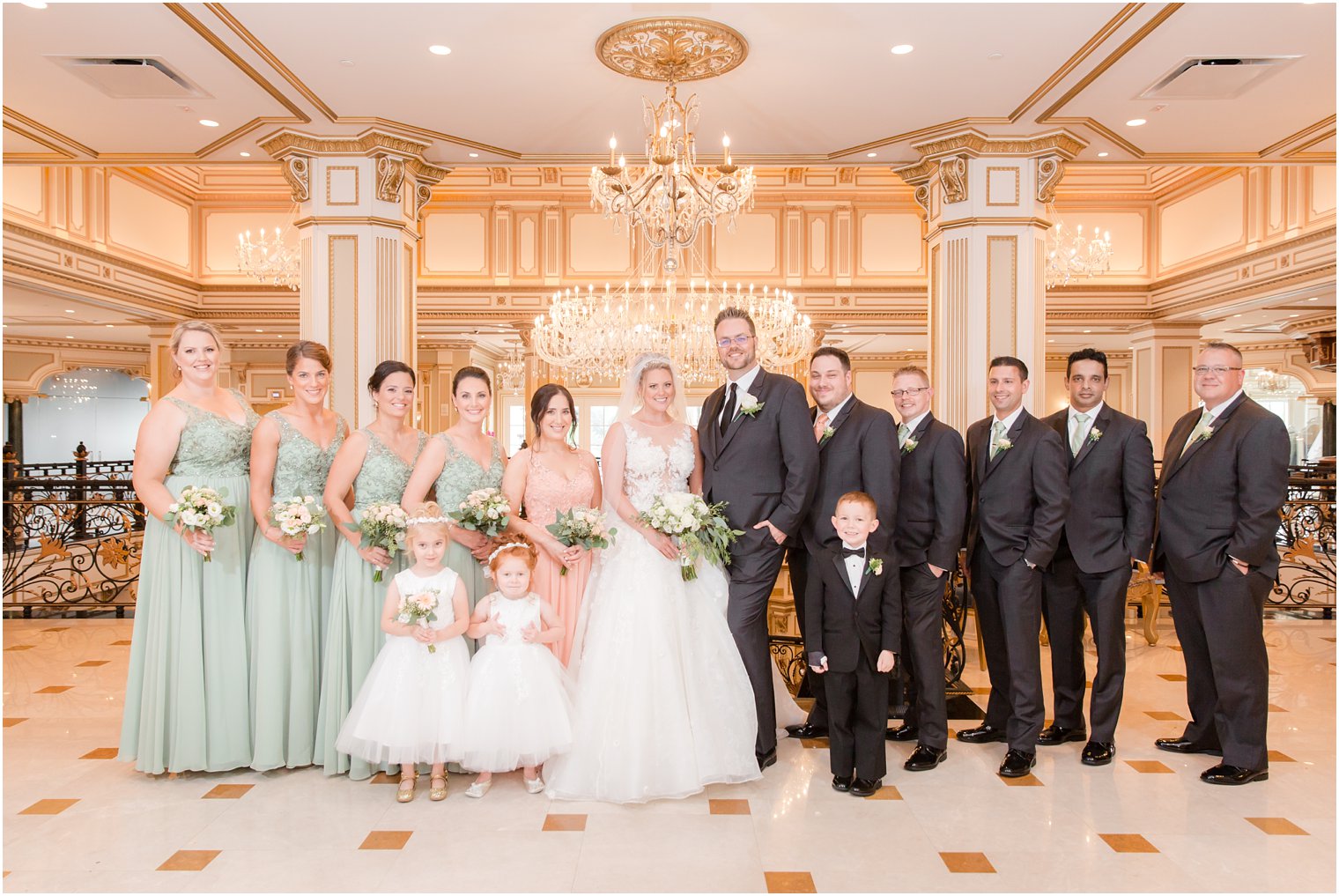 bridal party poses in Legacy Castle in North Jersey for wedding portraits by Idalia Photography