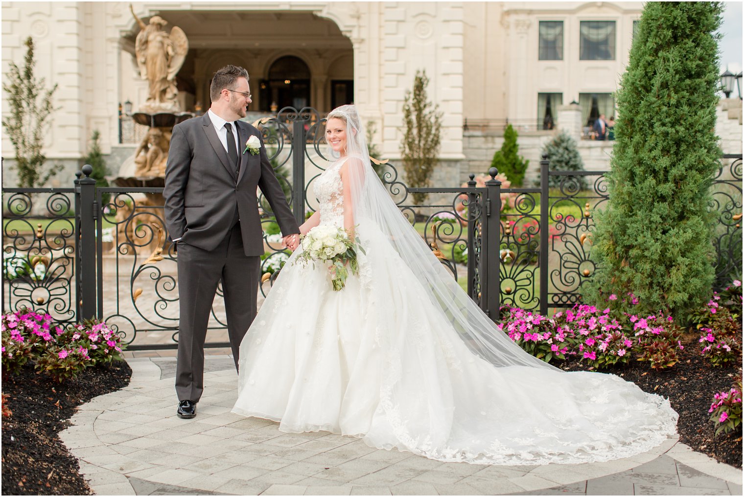 bride and groom portraits in gardens at Legacy Castle with Idalia Photography