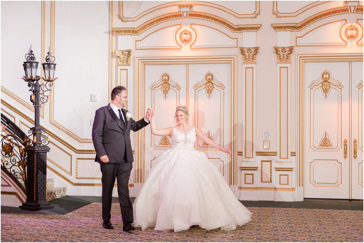 bride and groom enter Legacy Castle reception