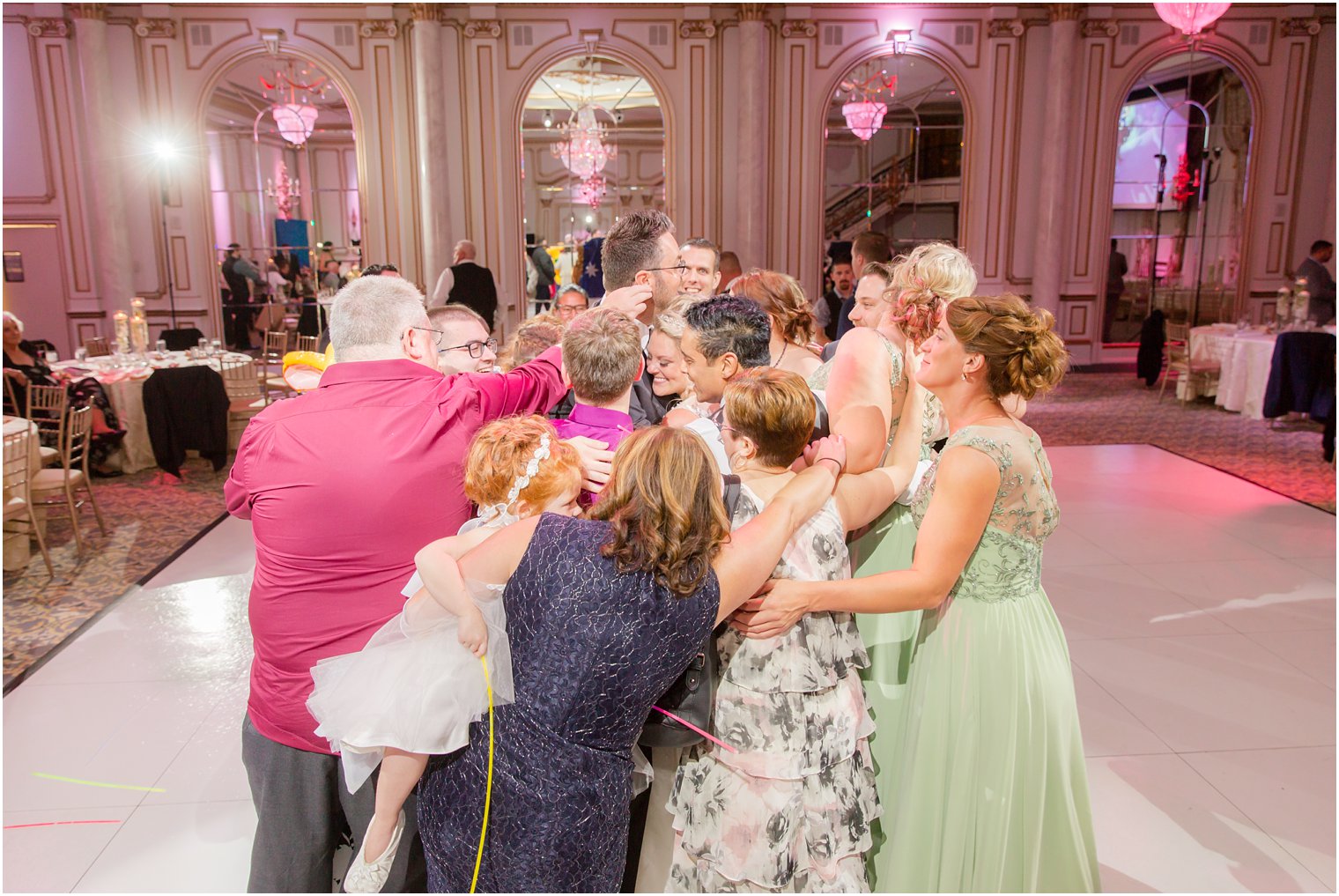 love-filled wedding reception at Legacy Castle photographed by Idalia Photography