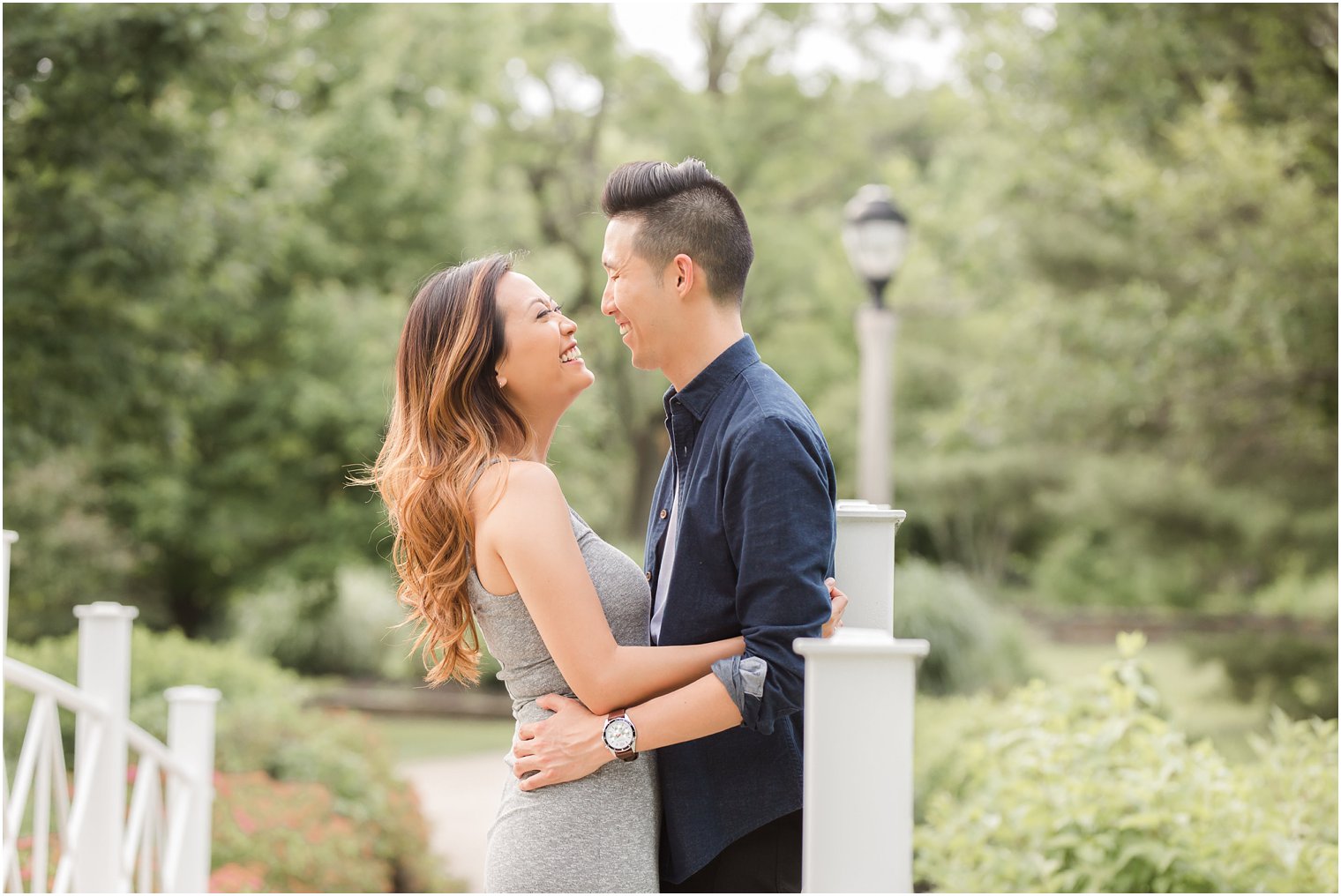 casual laughs during Sayen House and Gardens engagement session with Idalia Photography