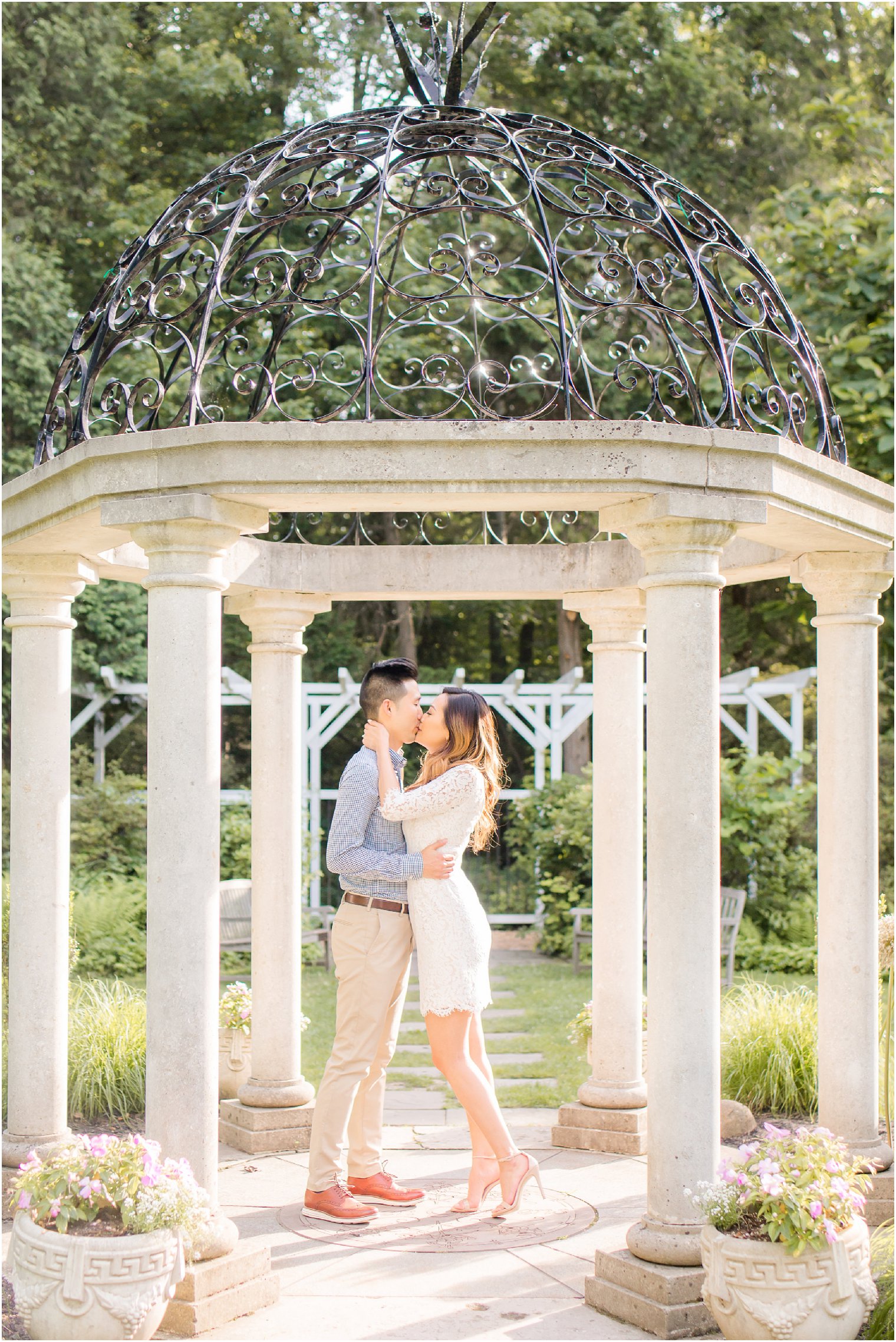 NJ wedding photographer photographs couple in gazebo at Sayen House and Gardens 