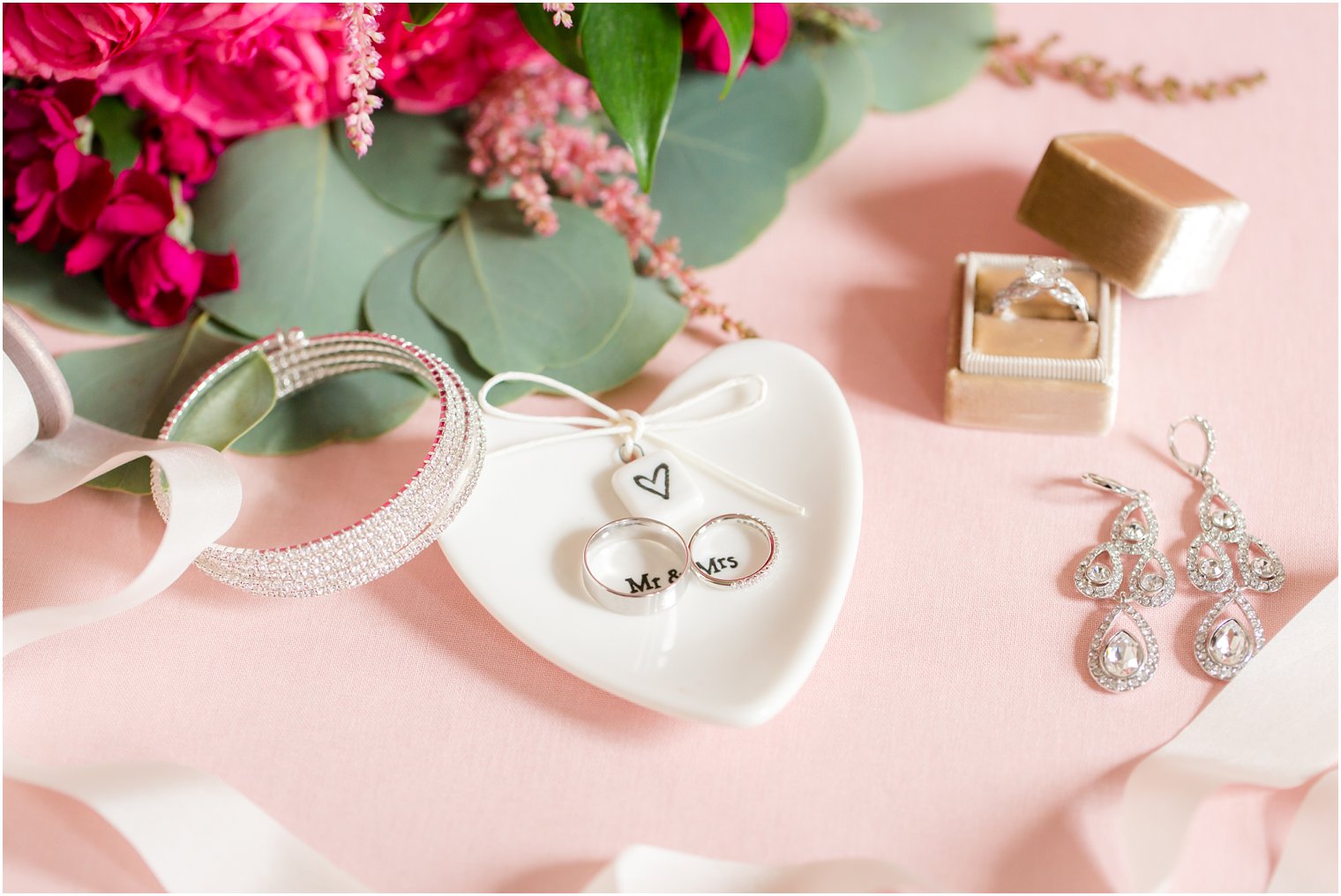 wedding rings on Mr. and Mrs. ring dish