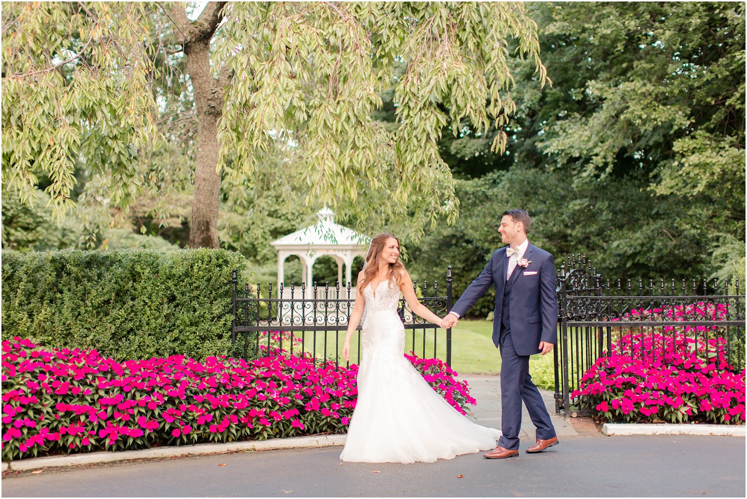 bride and groom walking to their reception at Shadowbrook