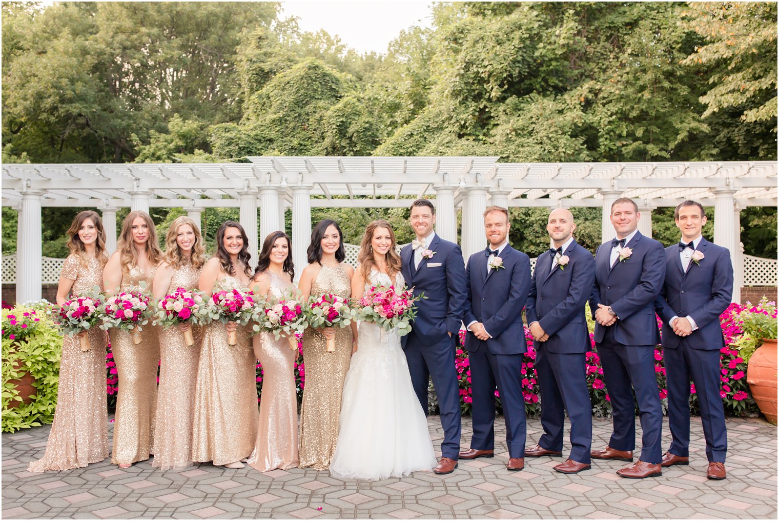bridal party wearing gold and navy