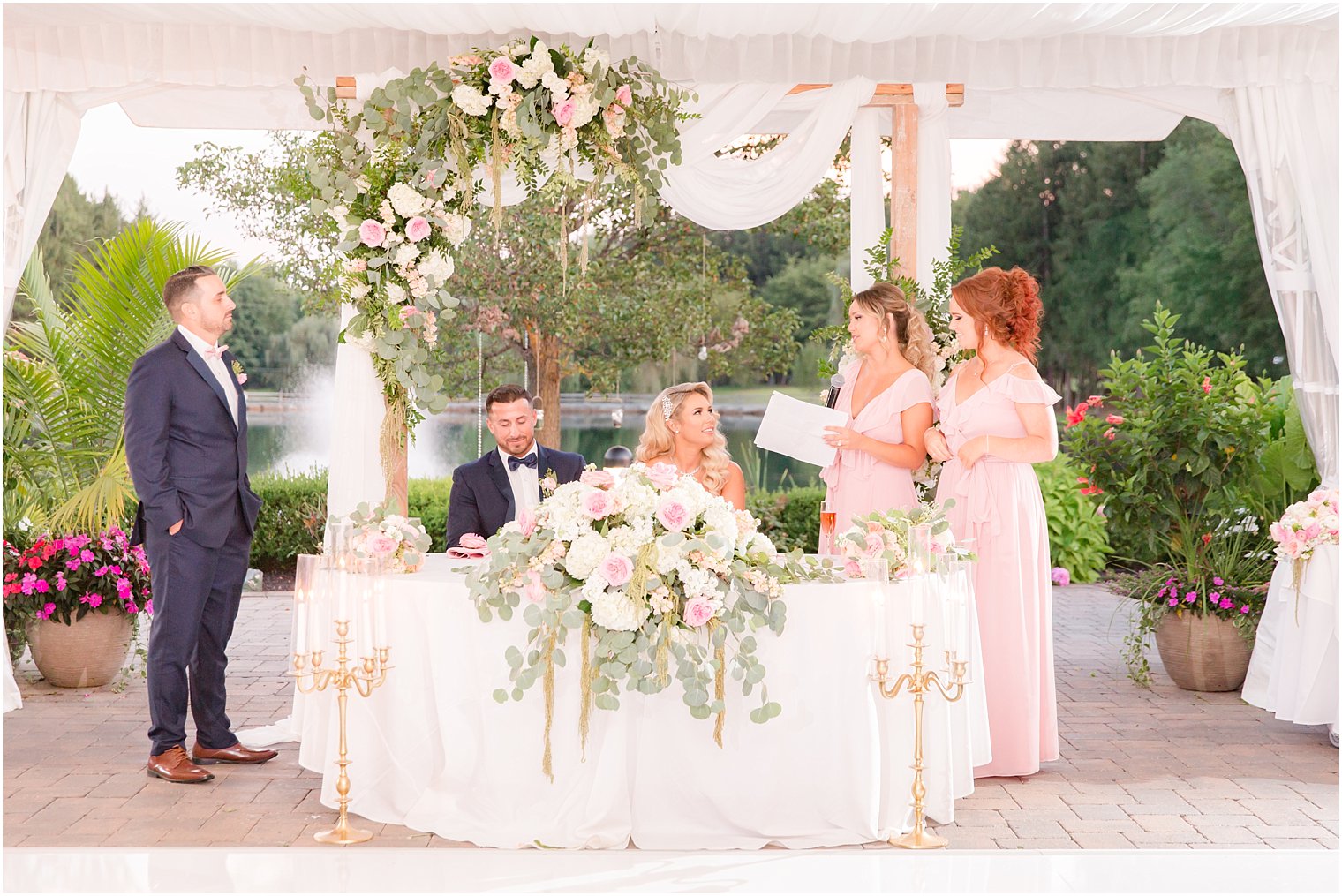 wedding toasts at Windows on the Water at Frogbridge tented reception 