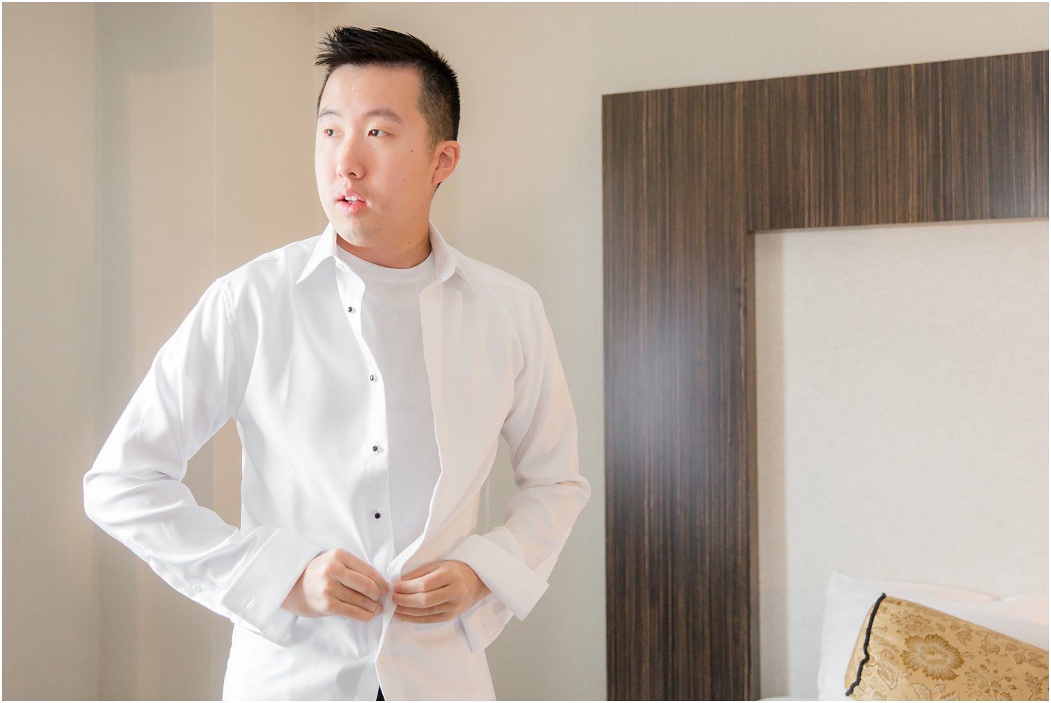 Groom getting ready on wedding day