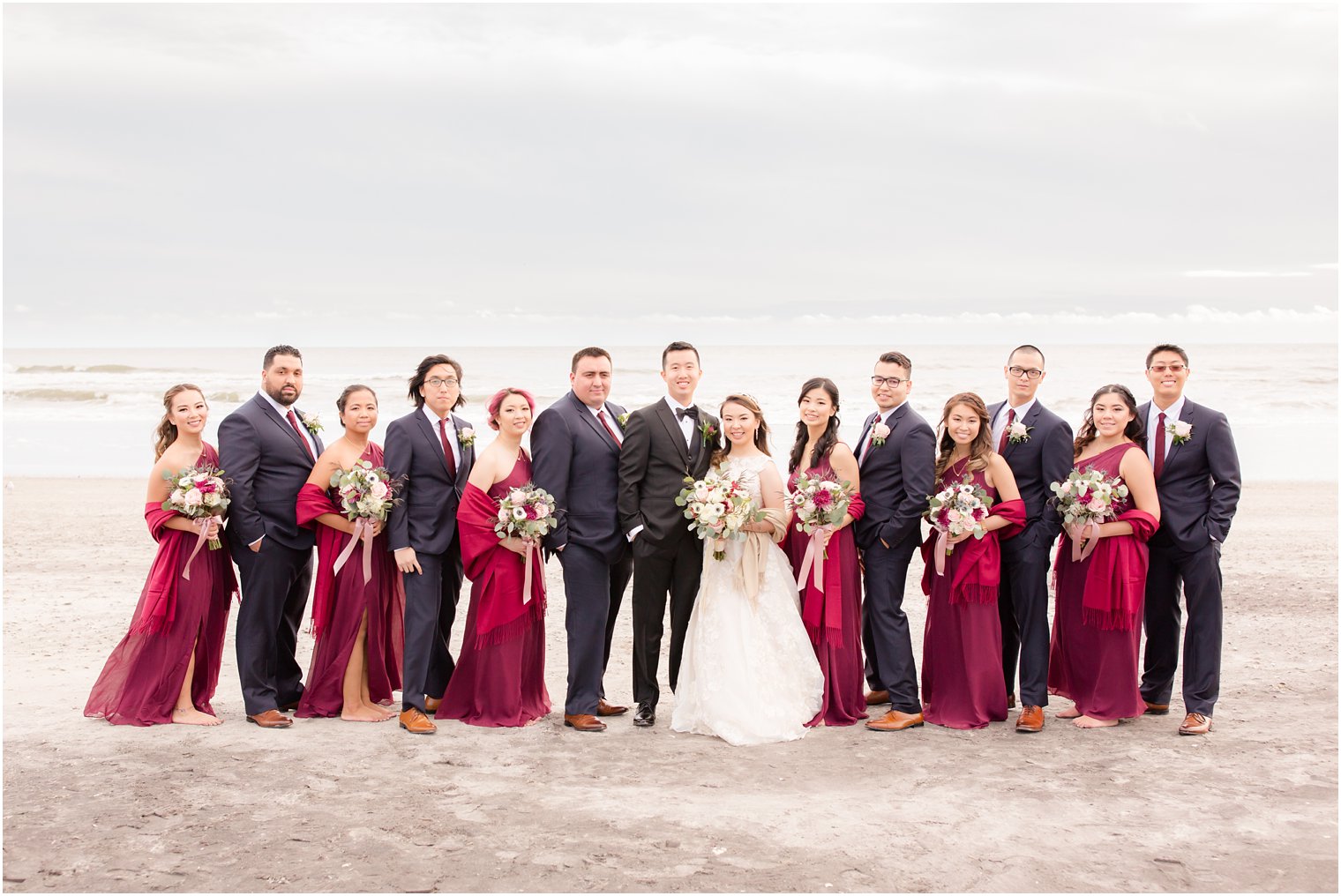 Bridal party wearing burgundy and navy