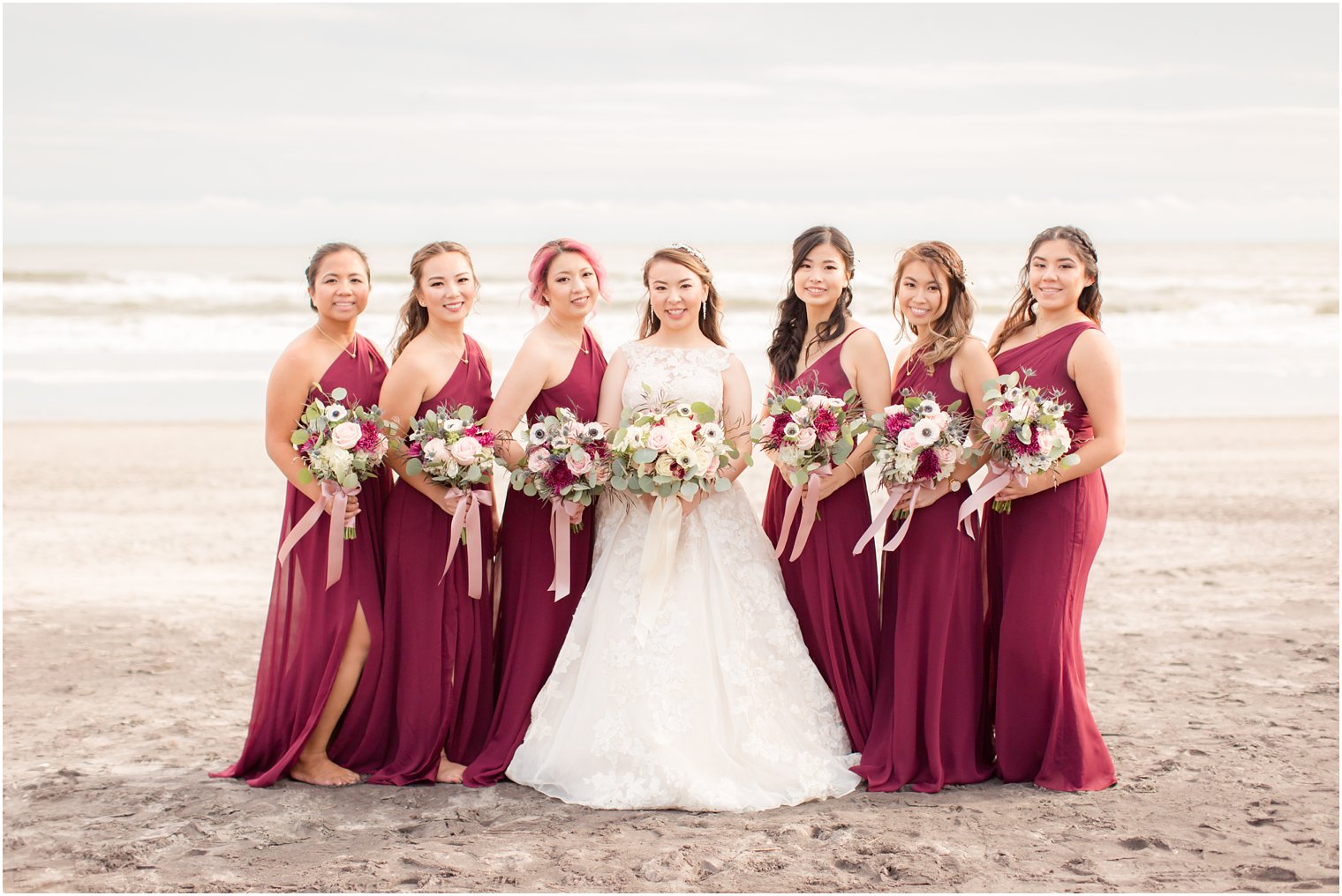 Bride and bridesmaids wearing dresses from David's Bridal dresses