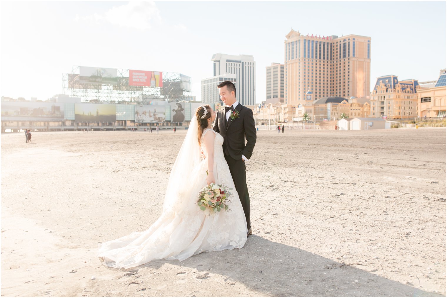 wedding portrait of couple on the beach at Claridge Hotel Wedding