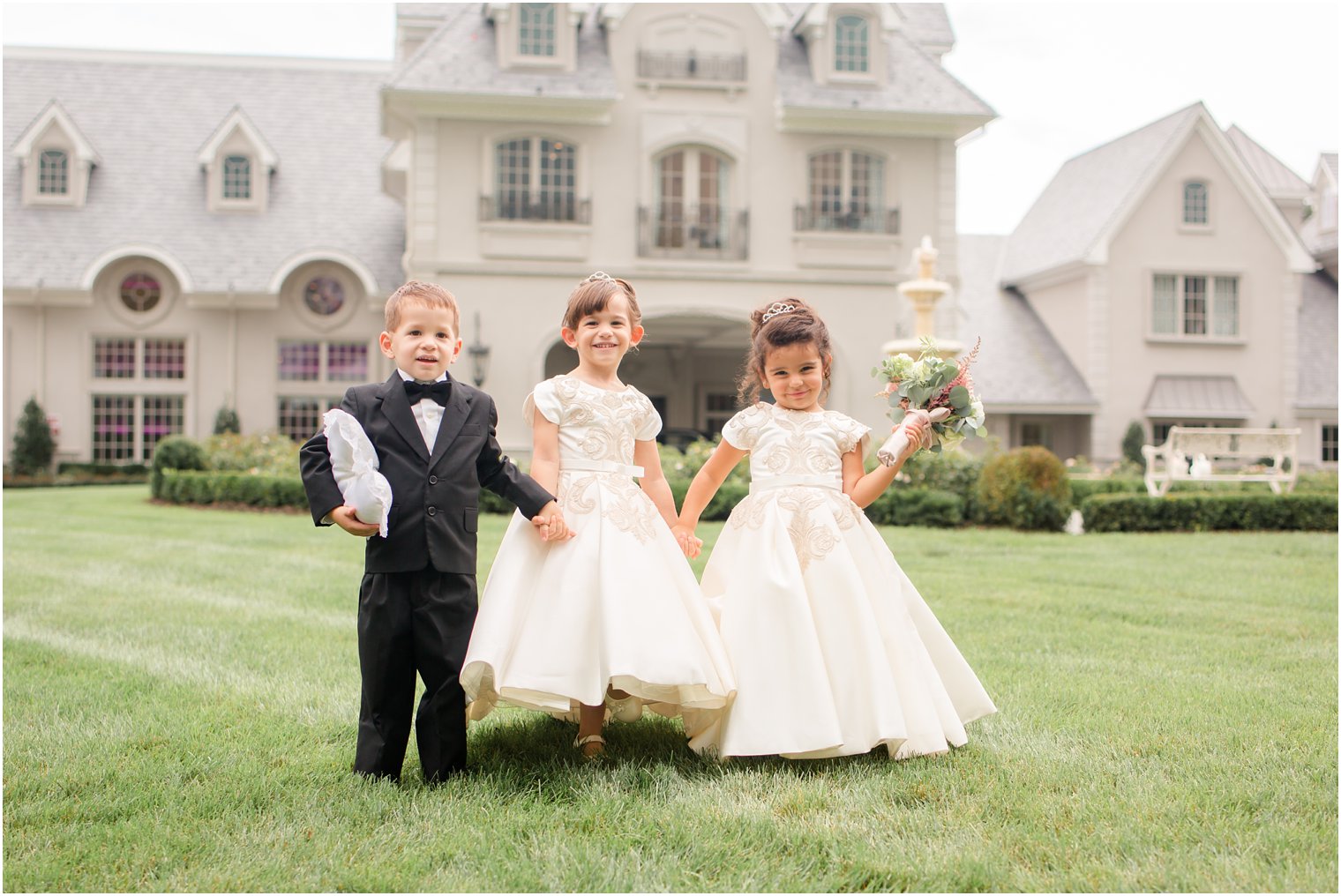 flower girls and ring bearer on wedding day