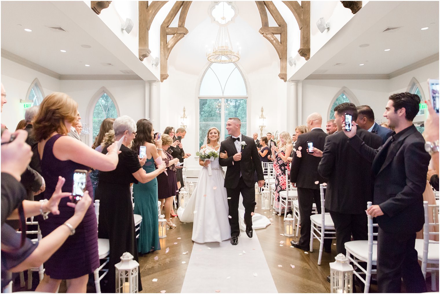 Newlyweds walking down the aisle