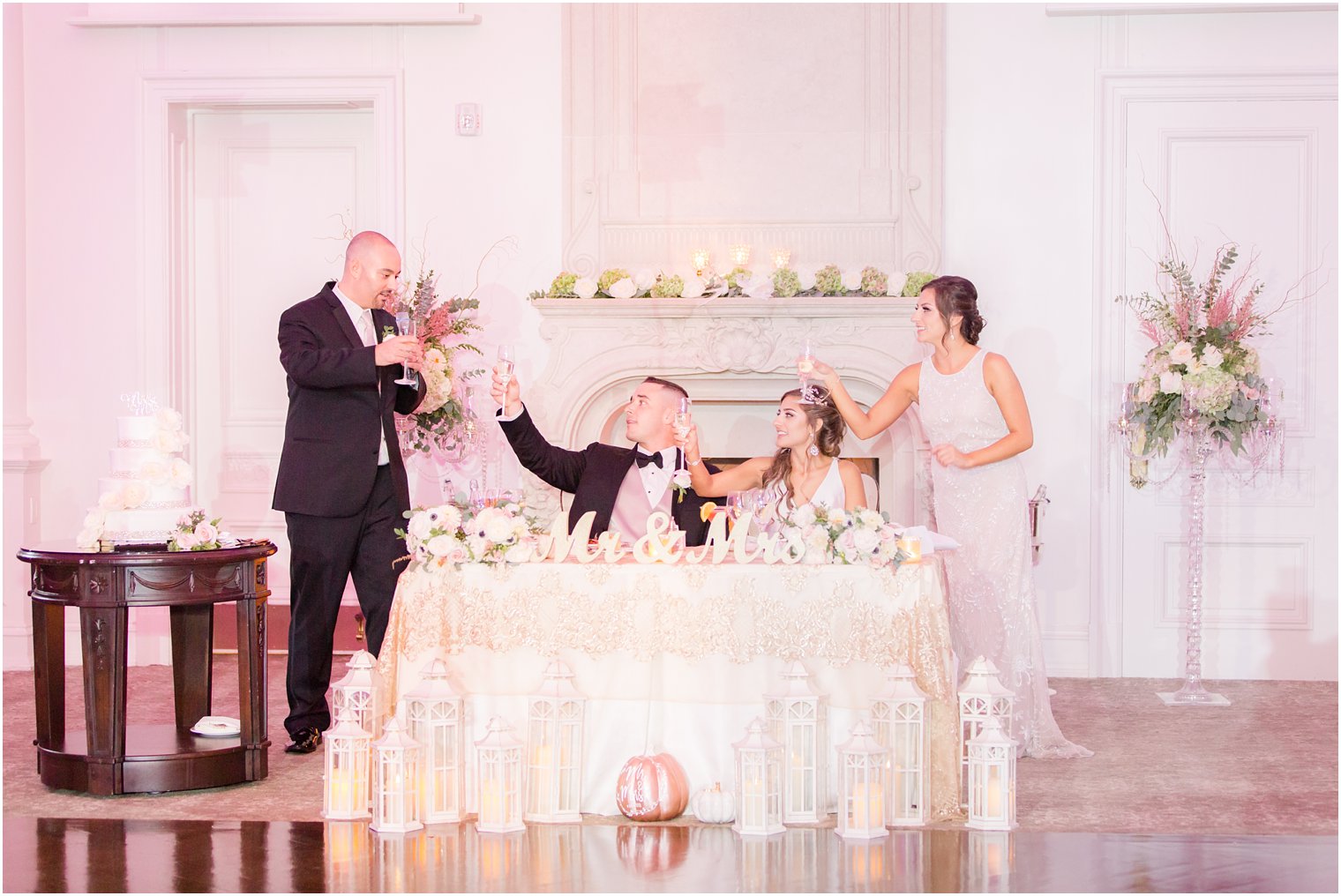 maid of honor and best man toasting to the newlyweds