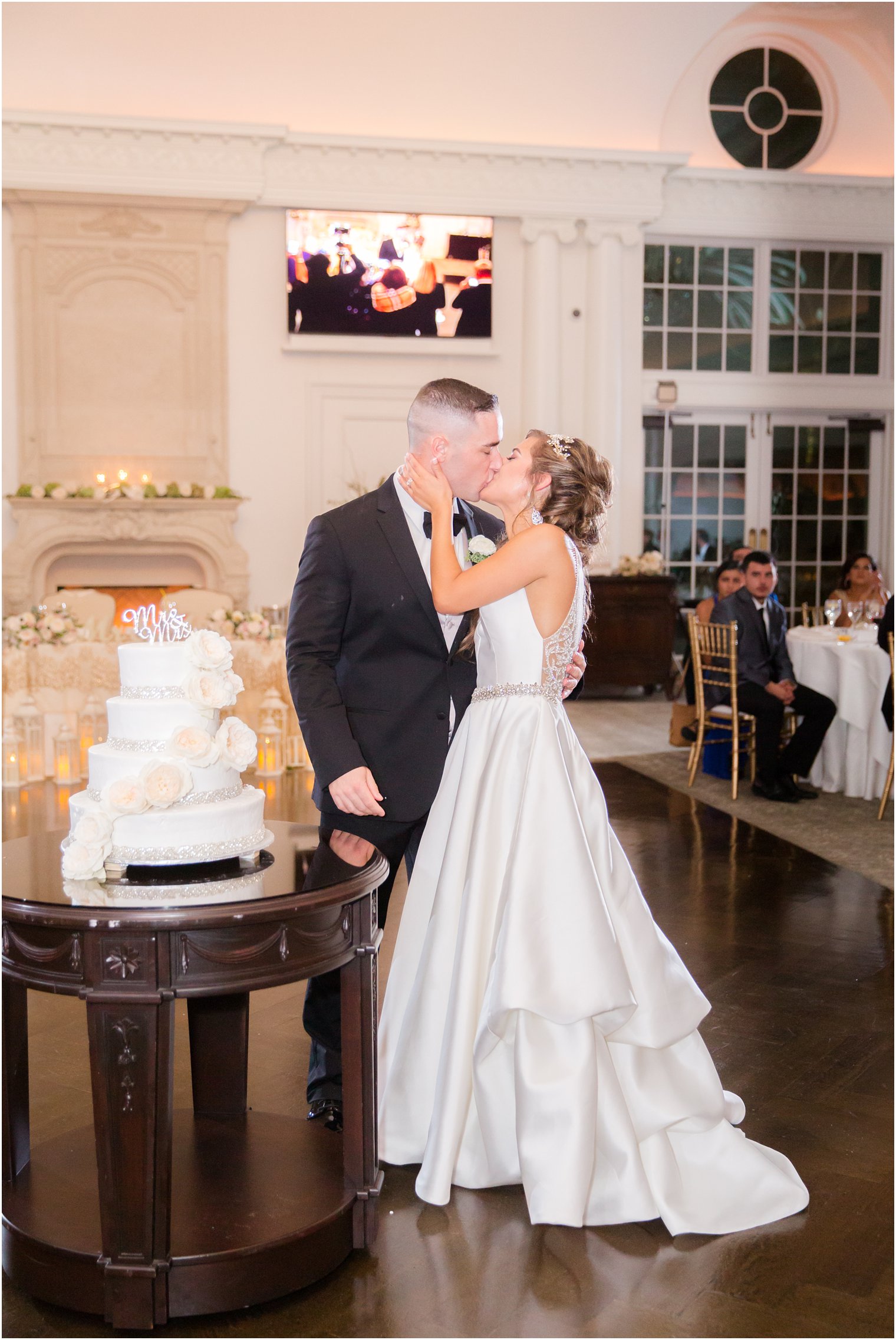 bride and groom cutting cake | Park Chateau Wedding Photography