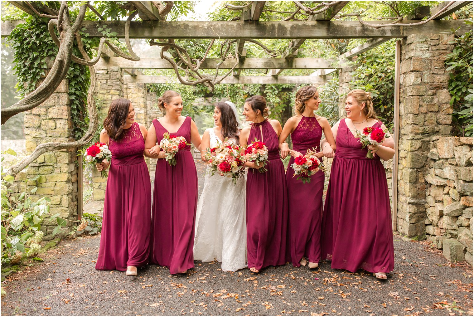 Bill Levkoff burgundy wedding dresses photographed by Idalia Photography at Olde Mill Inn