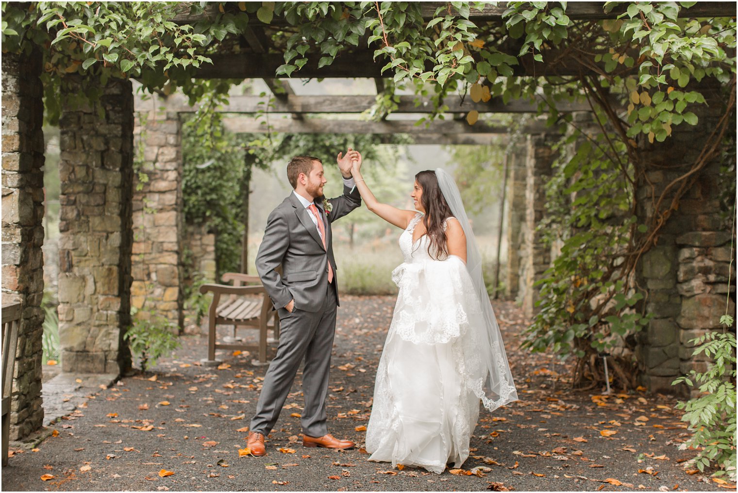 dancing wedding portraits at Olde Mill Inn garden photographed by Idalia Photography