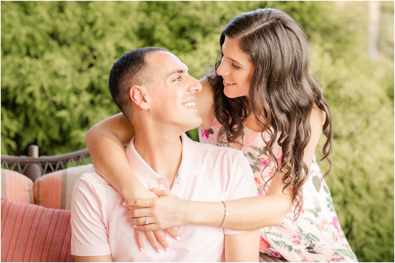 elegant couple smiling big at their engagement session in Cape May