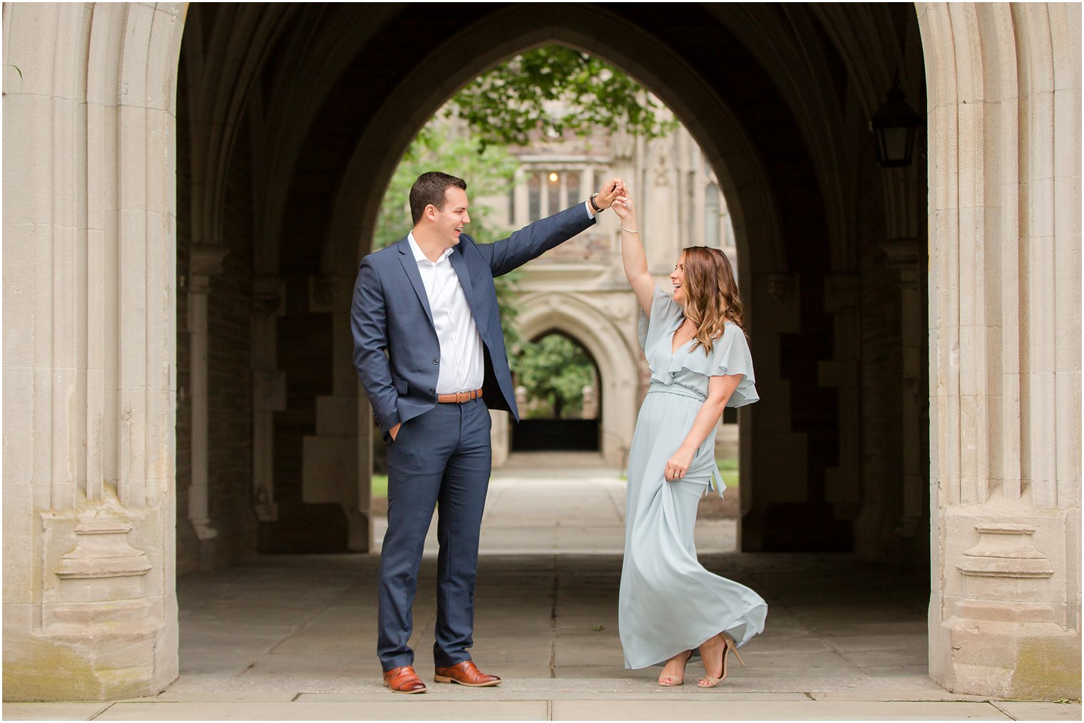 dancing during engagement portraits at Princeton University with Idalia Photography