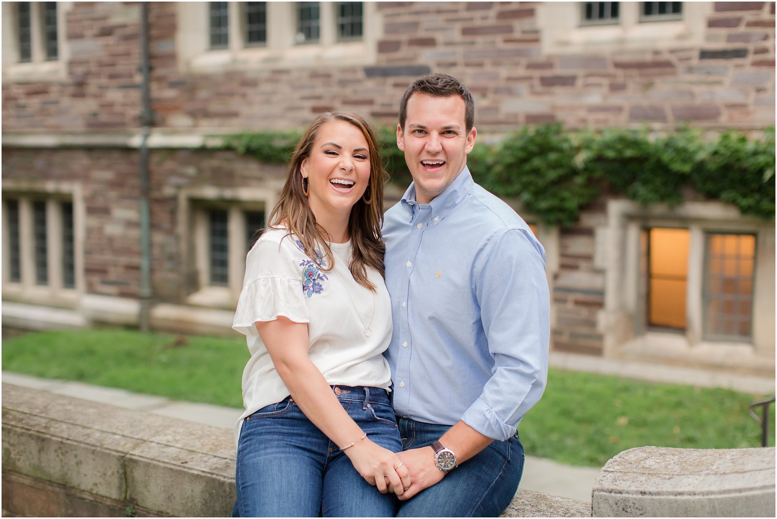happy couple during engagement portraits at Princeton University