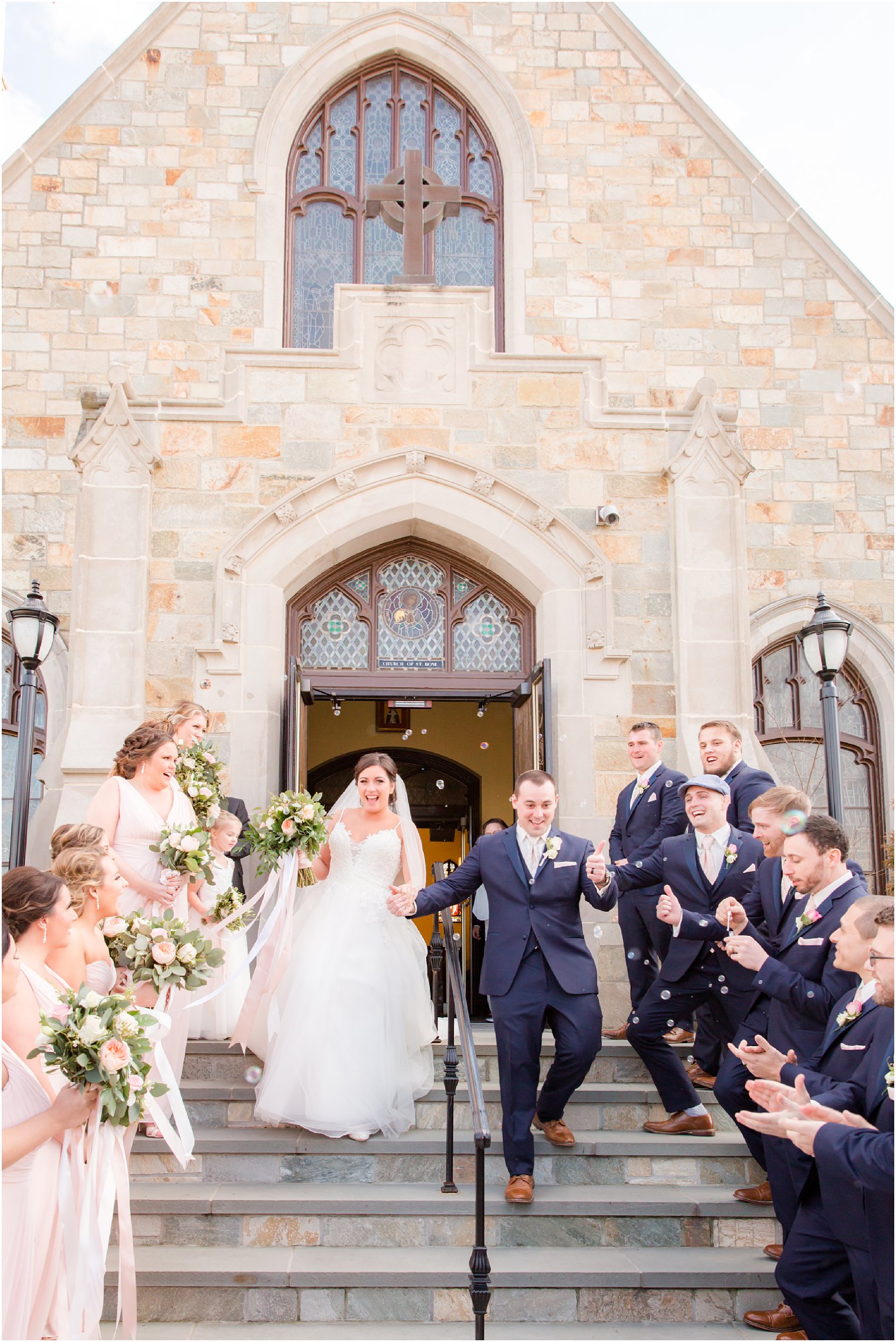 bride and groom exiting St. Rose Church in Belmar