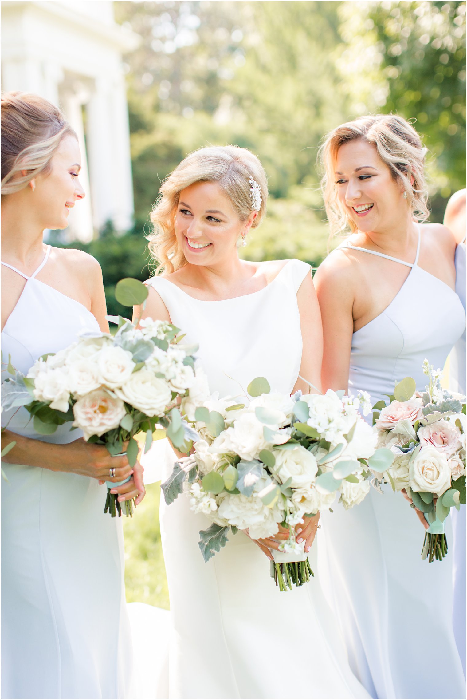 bride and bridesmaids with florals by Laurelwood Designs