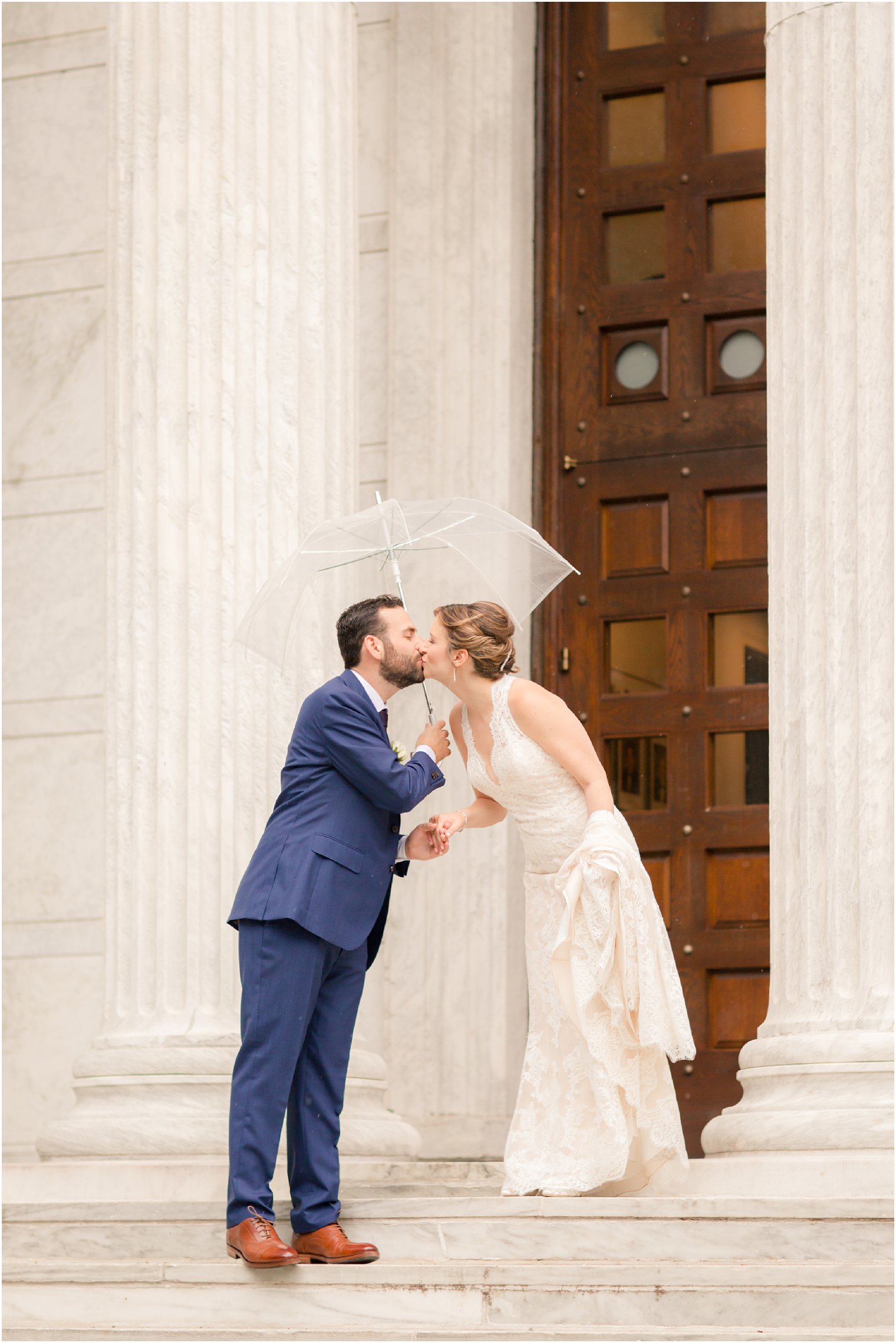 bride and groom rainy day photo at Princeton University