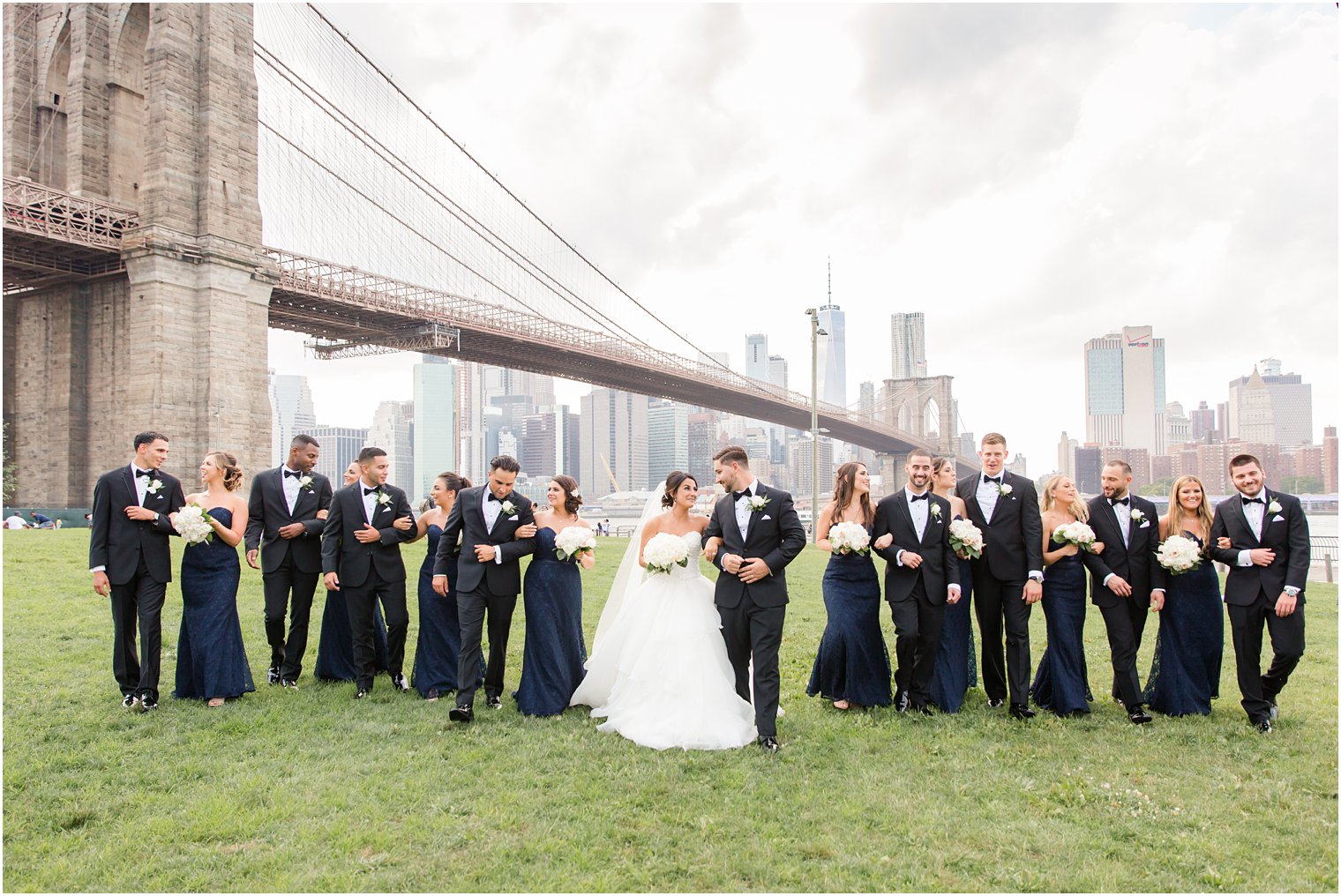 candid wedding photo at the Brooklyn Bridge
