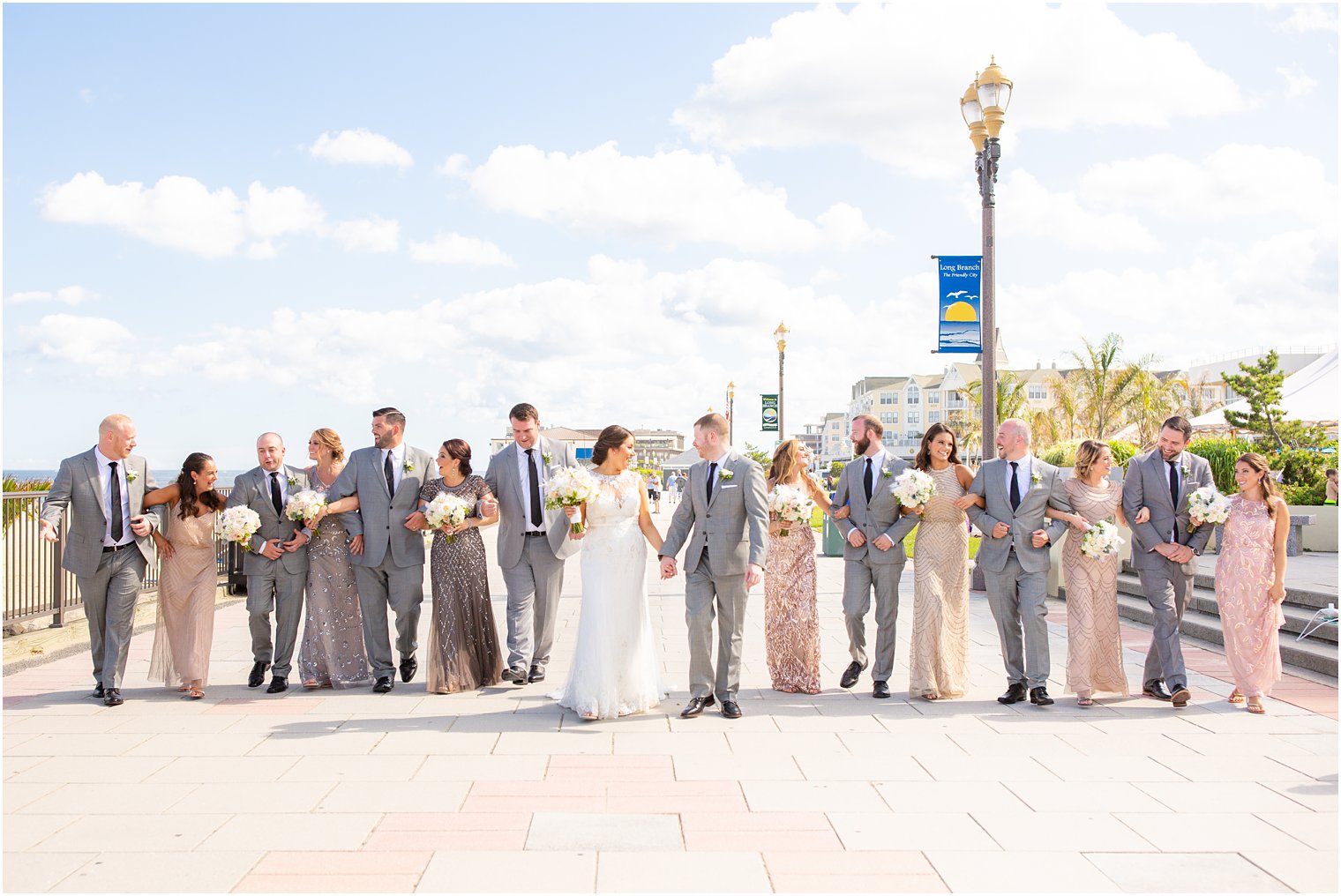 bridal party walking on the boardwalk 
