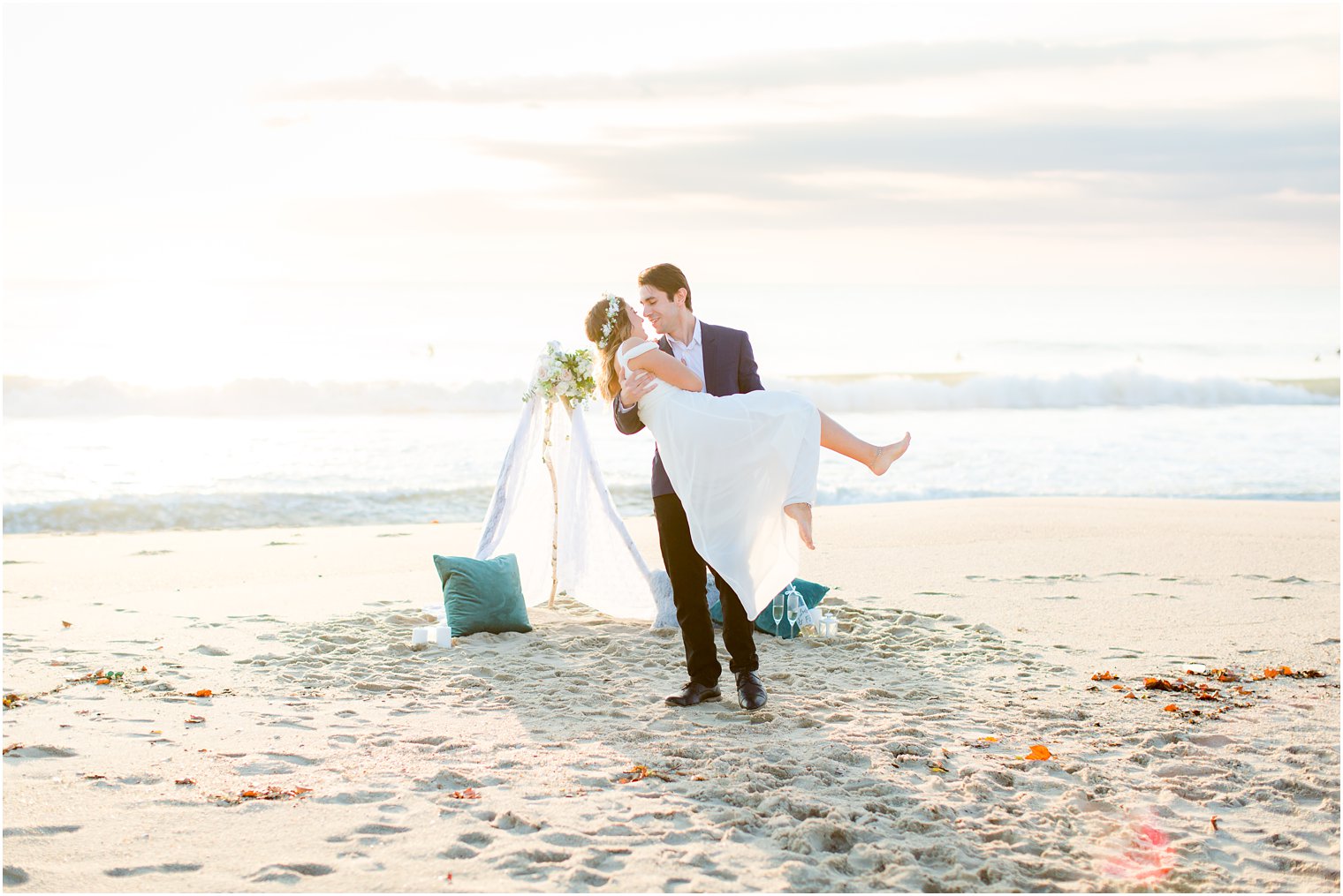 engaged couple on the beach