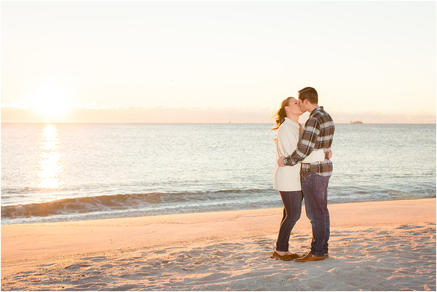 engagement photo taken at sunrise on the beach