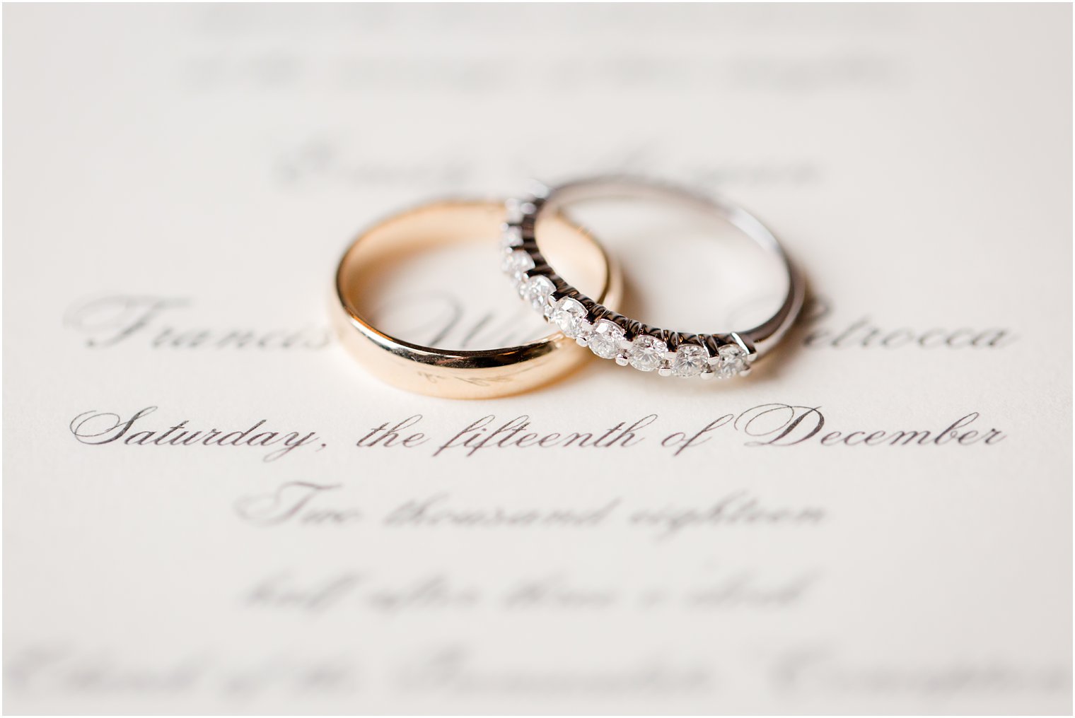 Wedding bands on invitation for Pleasantdale Chateau wedding