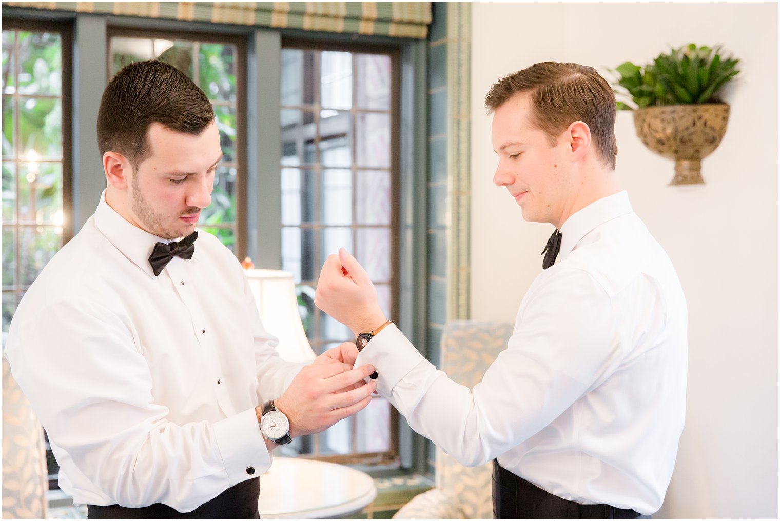 groom getting ready with best man