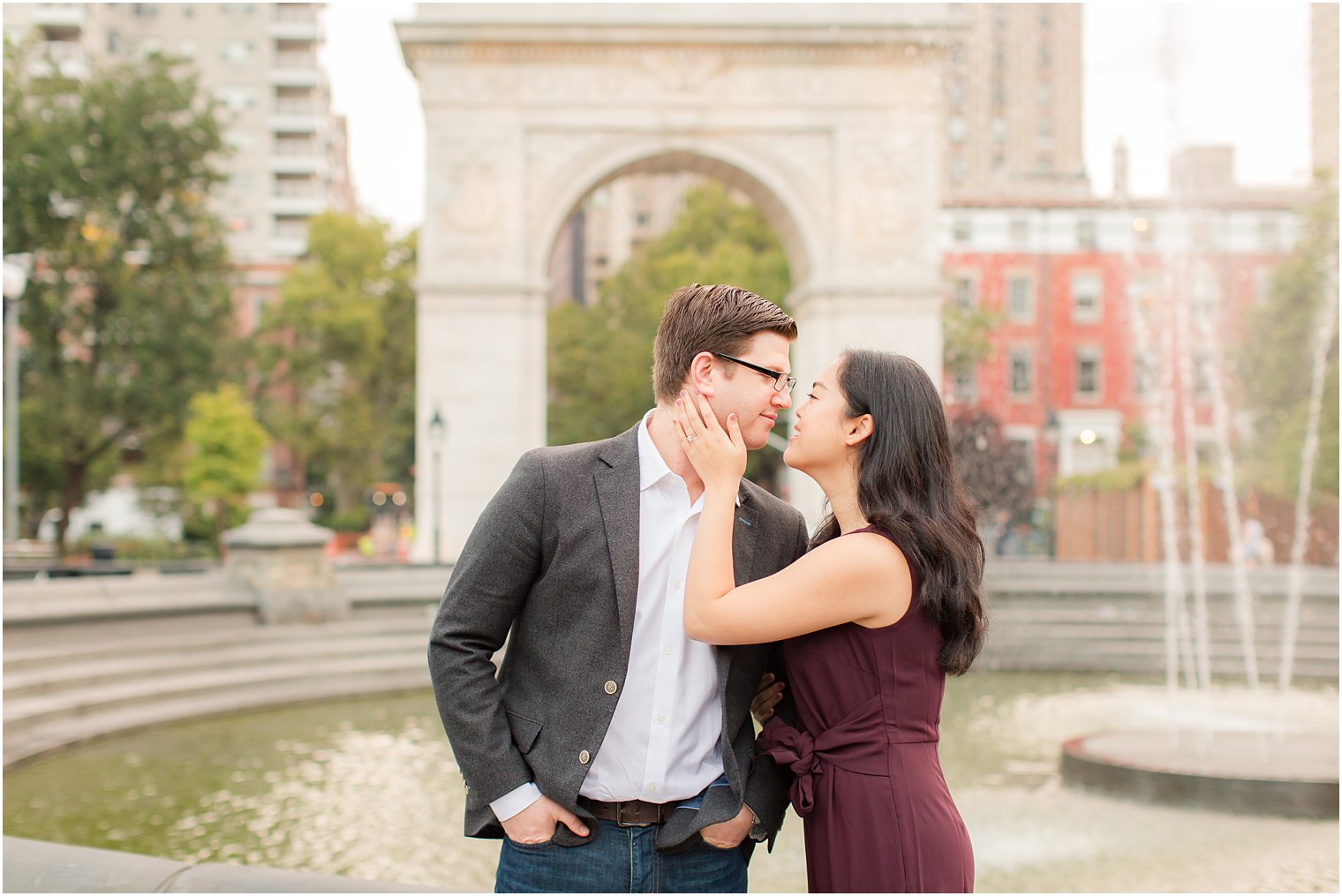 romantic engagement photo at Washington Square Park