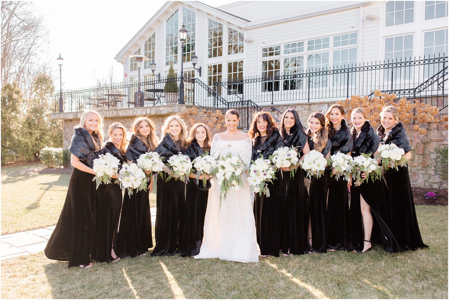 Bridesmaids in long black dresses