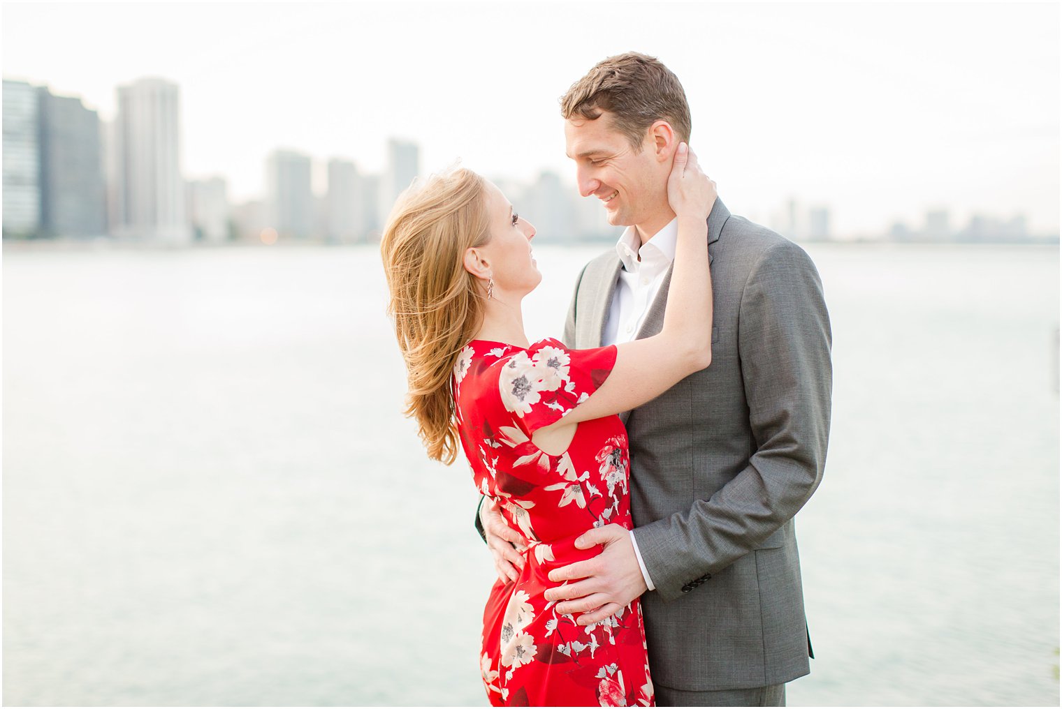 engagement photos at Milton Lee Olive Park featuring the Chicago skyline