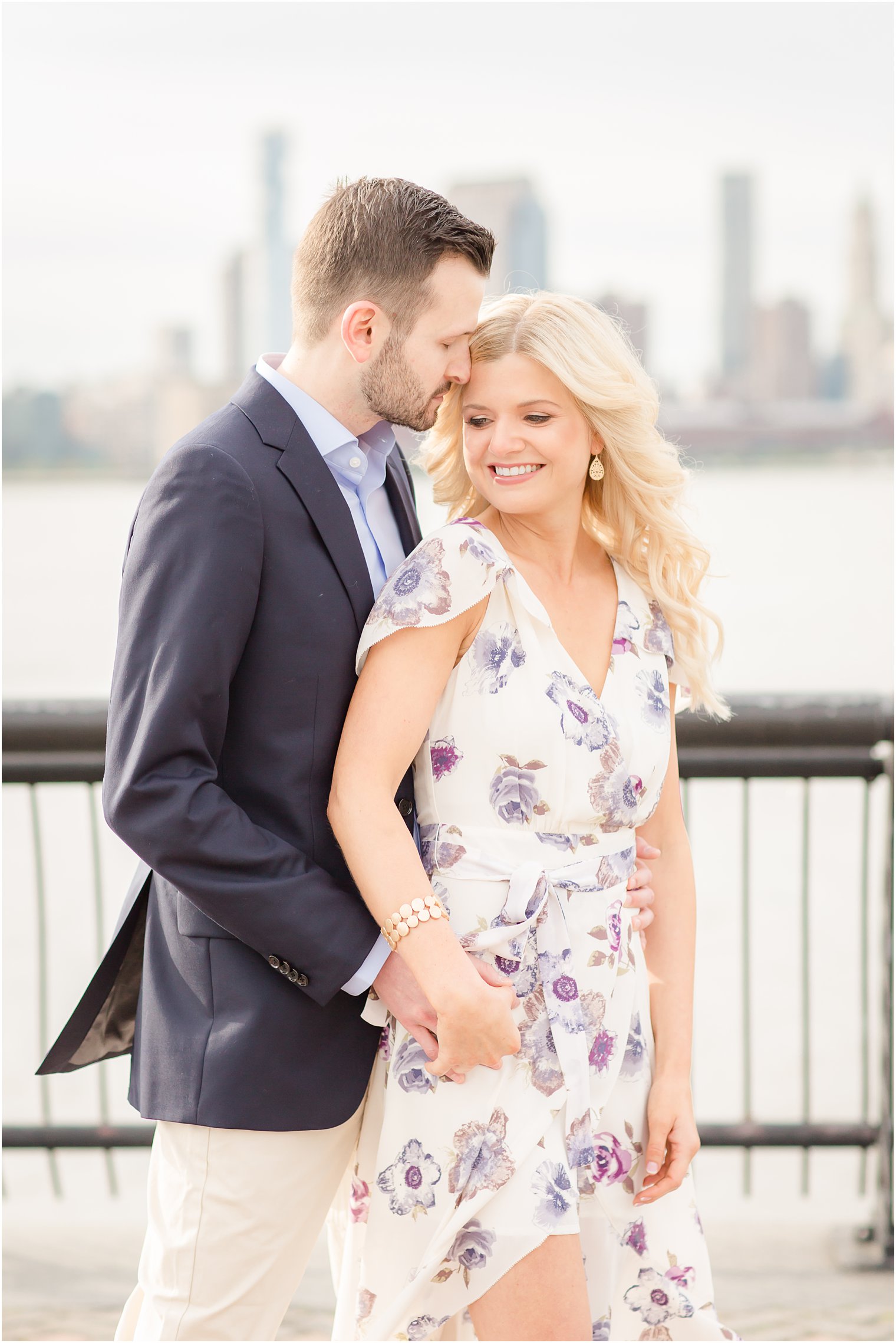 engagement photo outfit ideas with floral dress and navy suit
