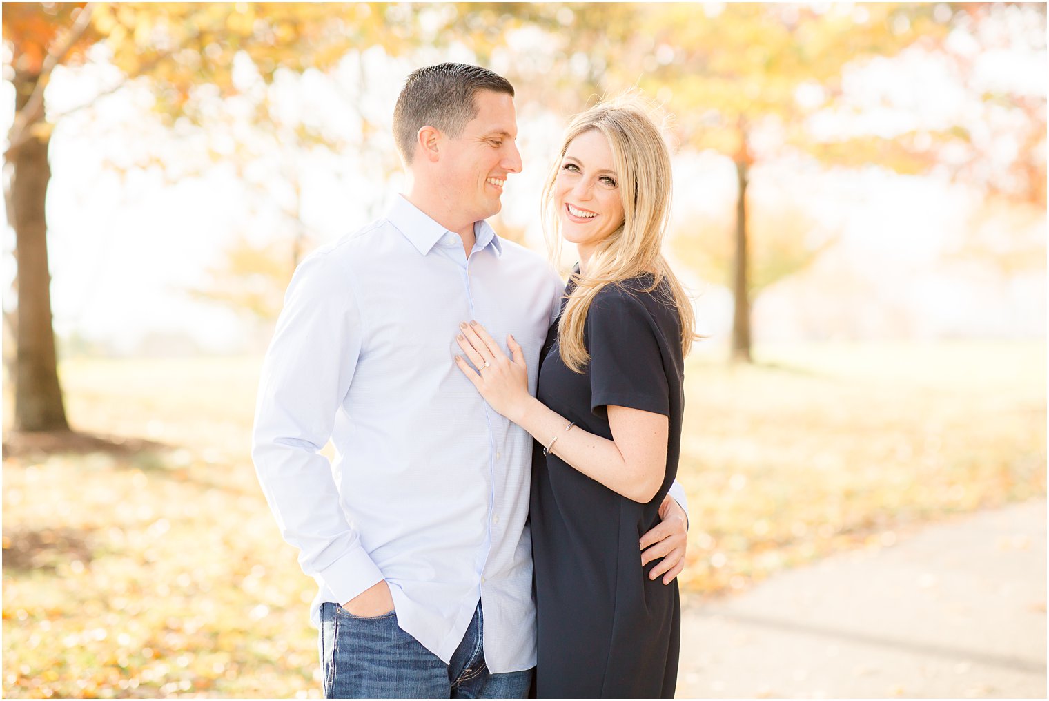 Golden fall glow during Liberty State Park Engagement Session