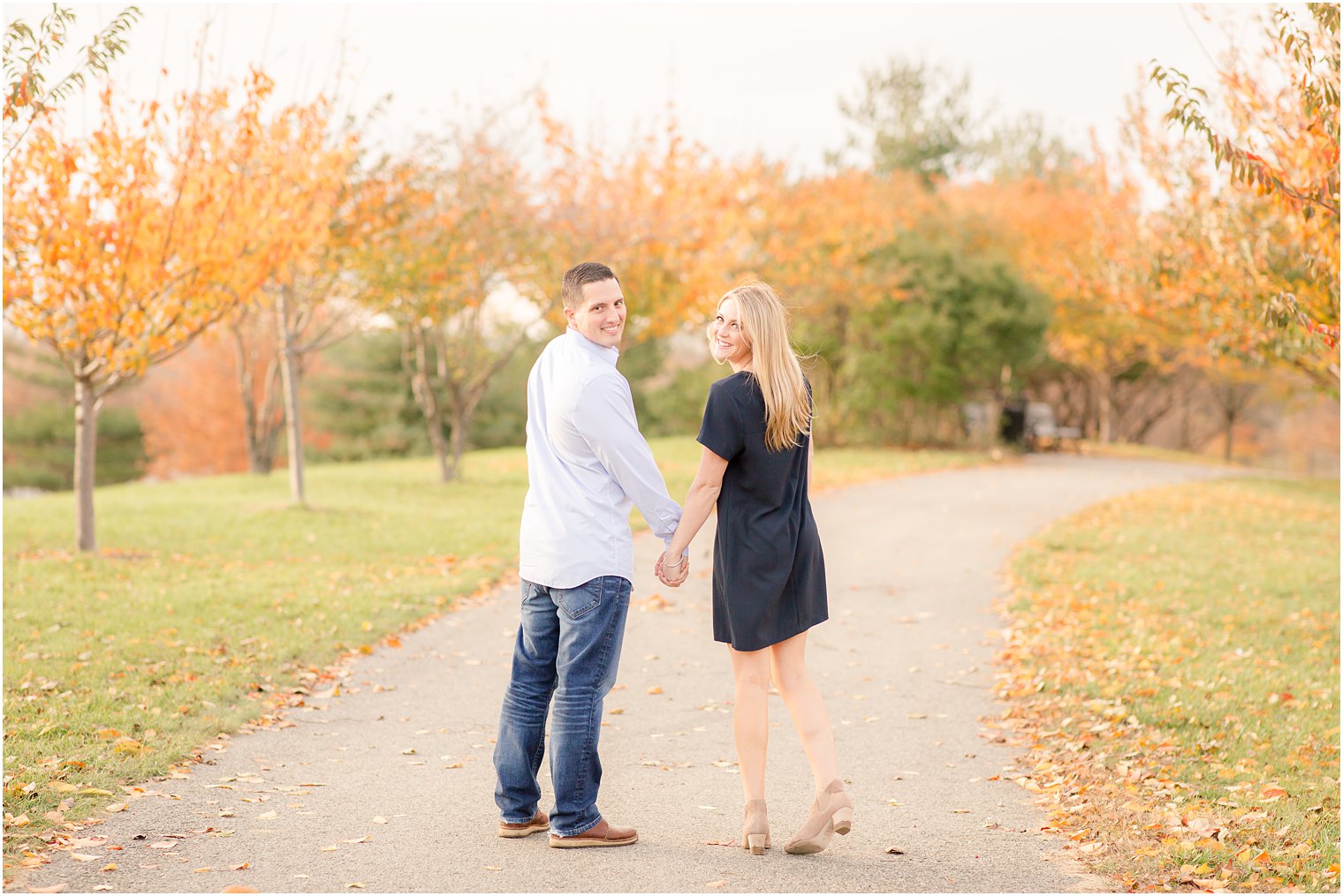 Engagement session with fall foliage at Liberty State Park