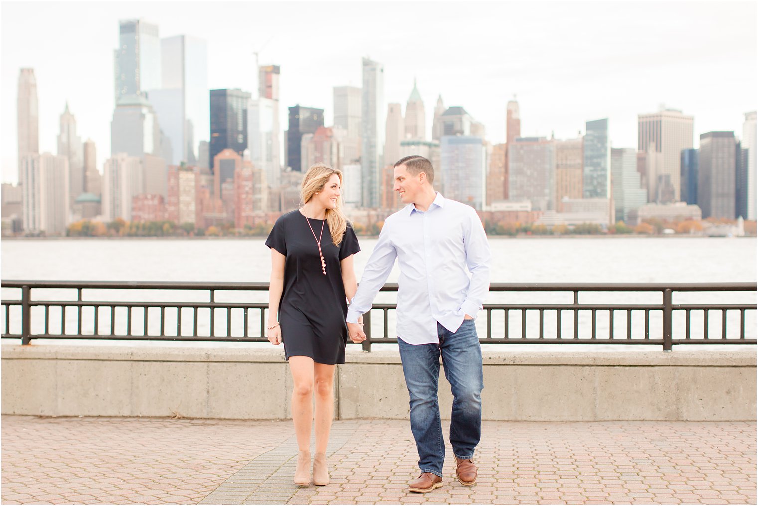 Candid photo during Engagement photos with NYC skyline