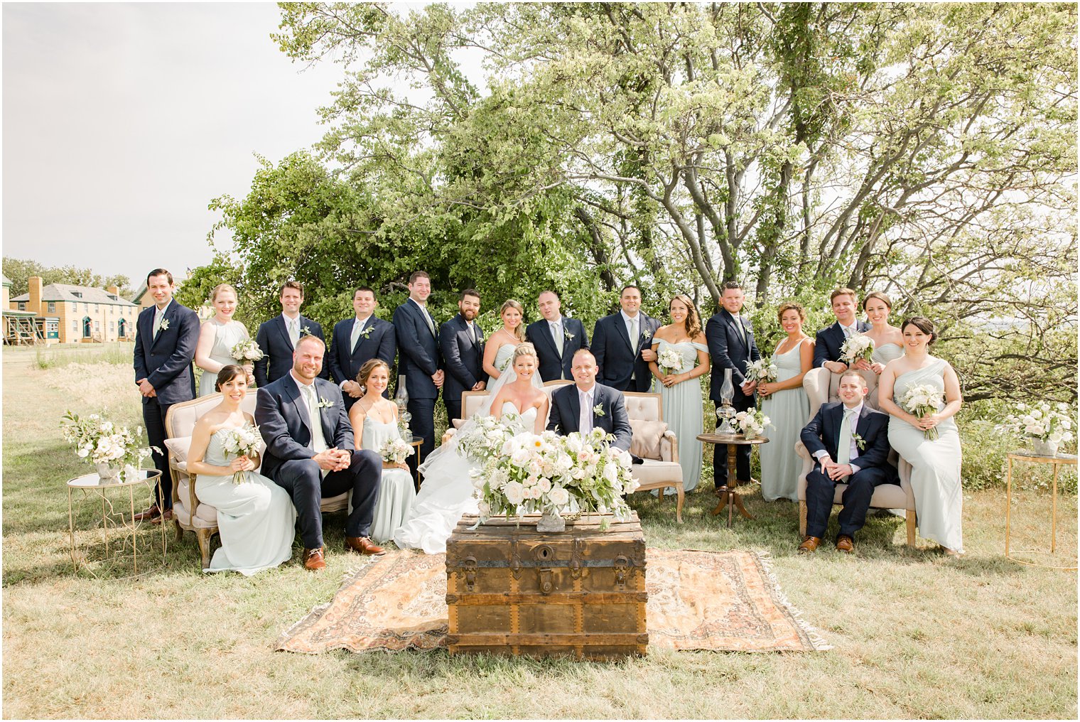 Bridal party sitting on vintage furniture