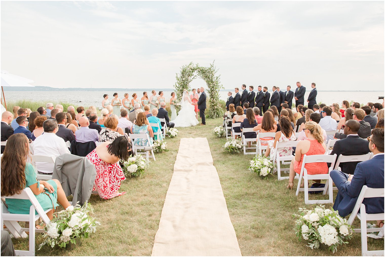 Waterfront wedding ceremony at Sandy Hook Chapel