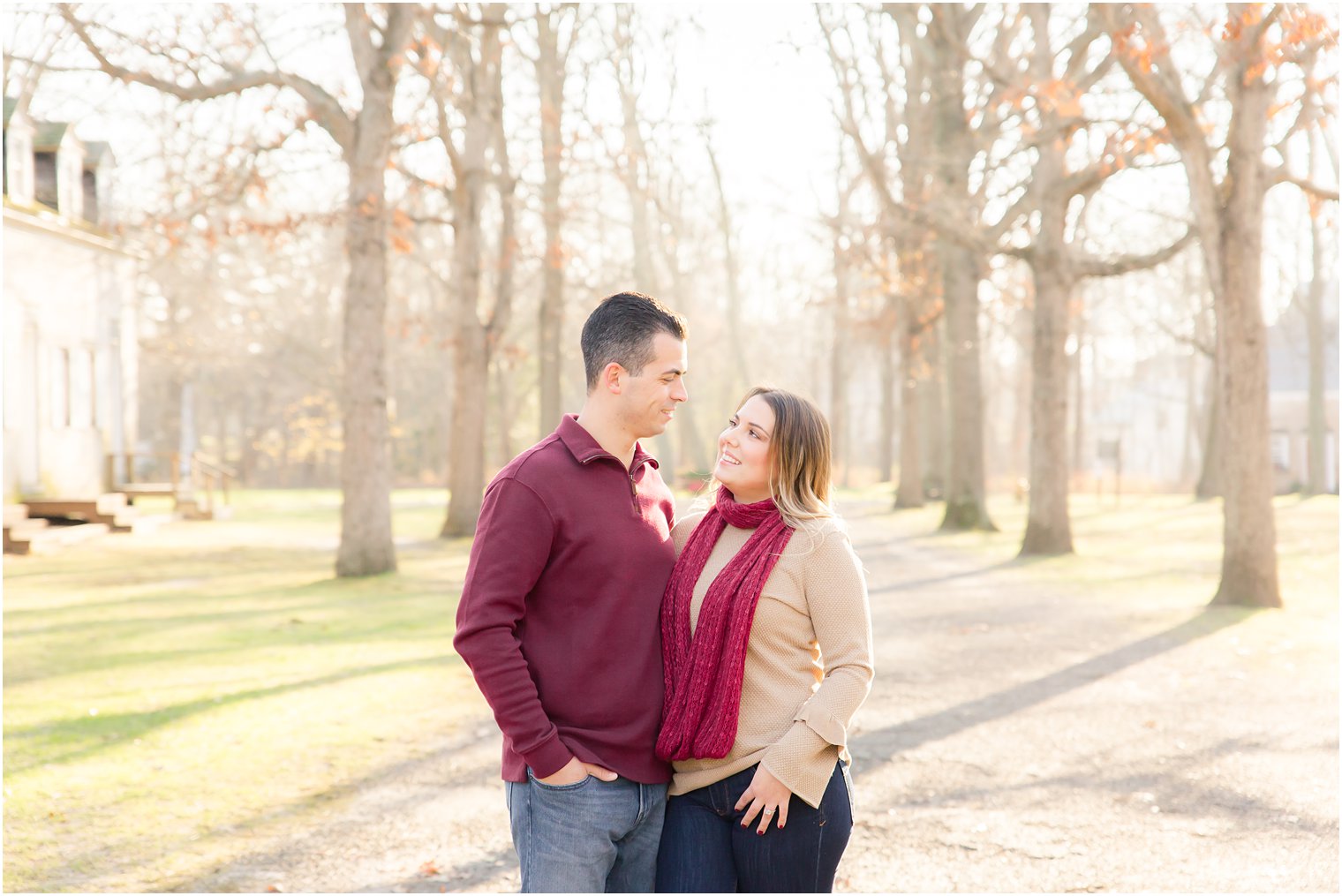 engaged couple posing for photos at Allaire State Park