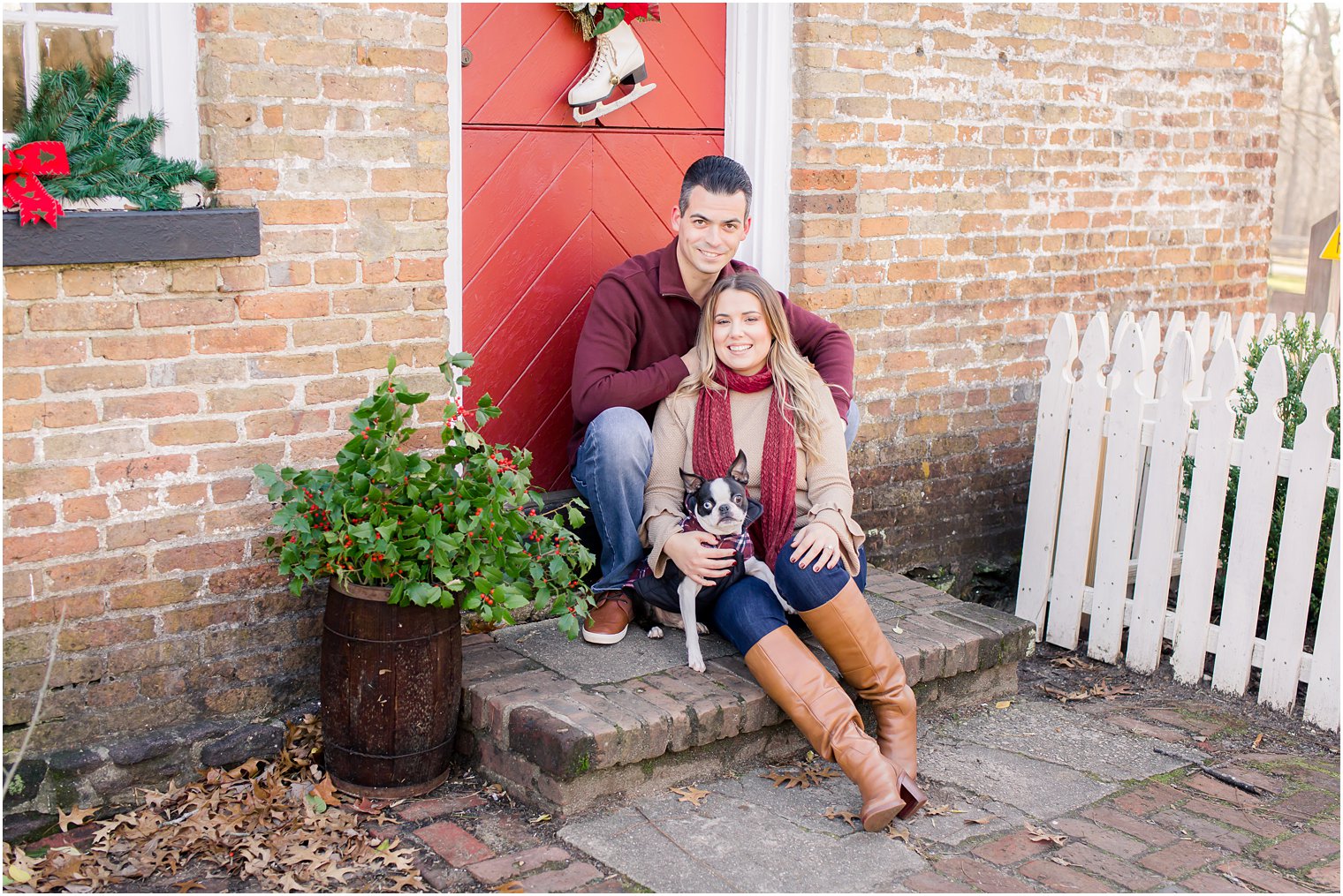 Christmas-themed engagement photo with dog