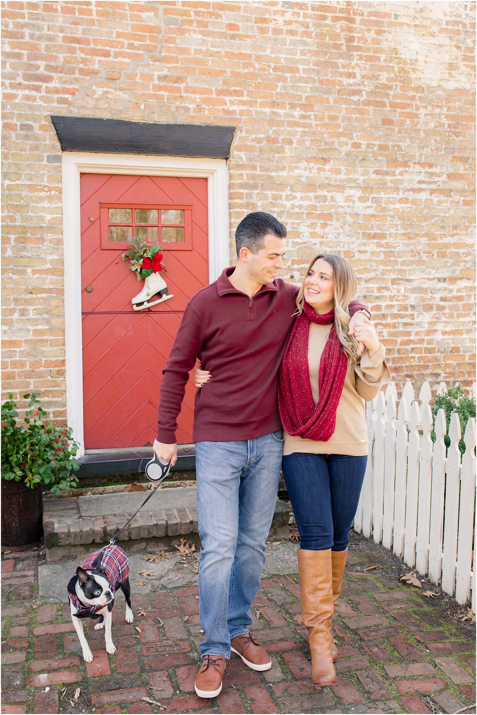 Candid engagement photo with dog