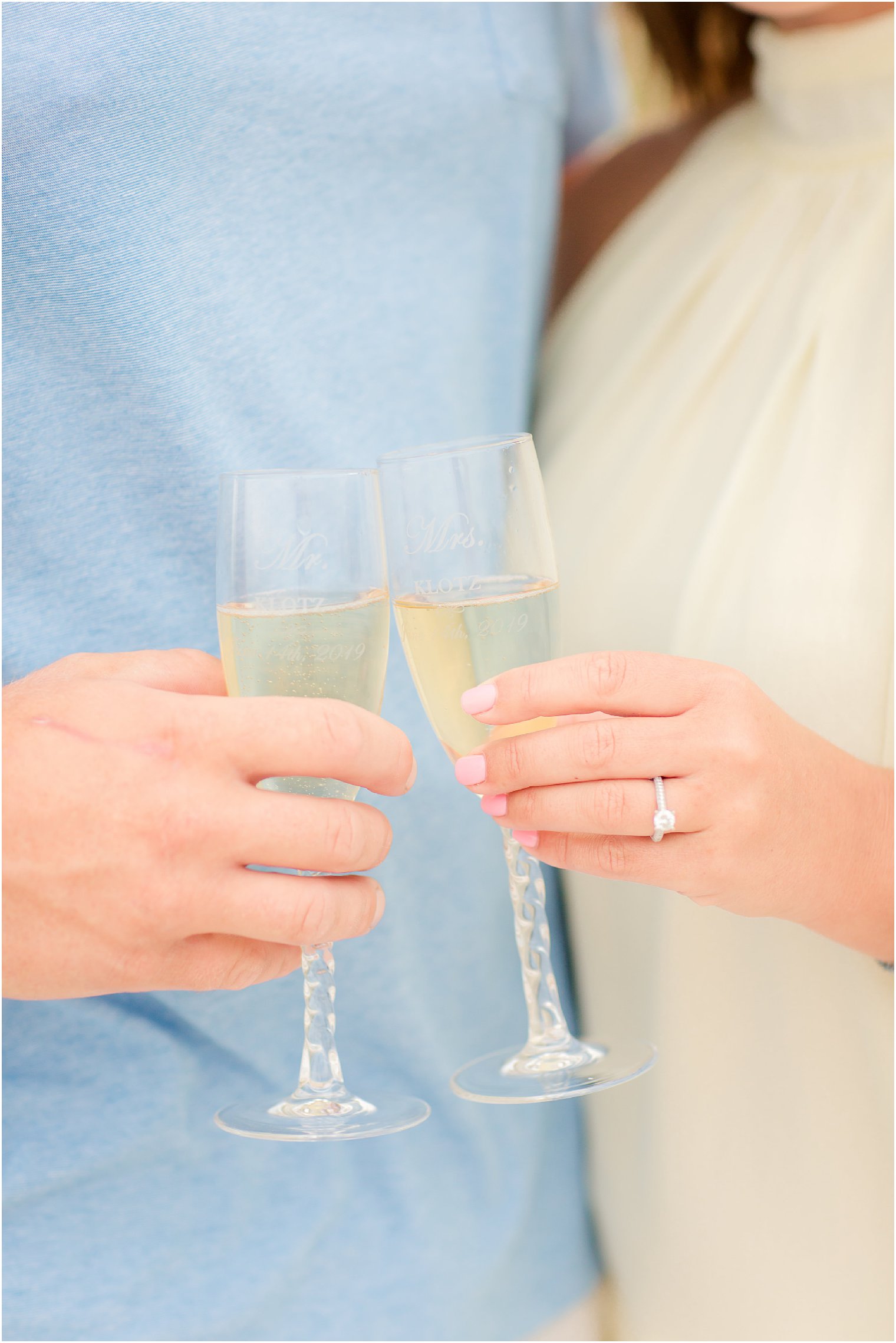 engagement session with champagne and custom flutes
