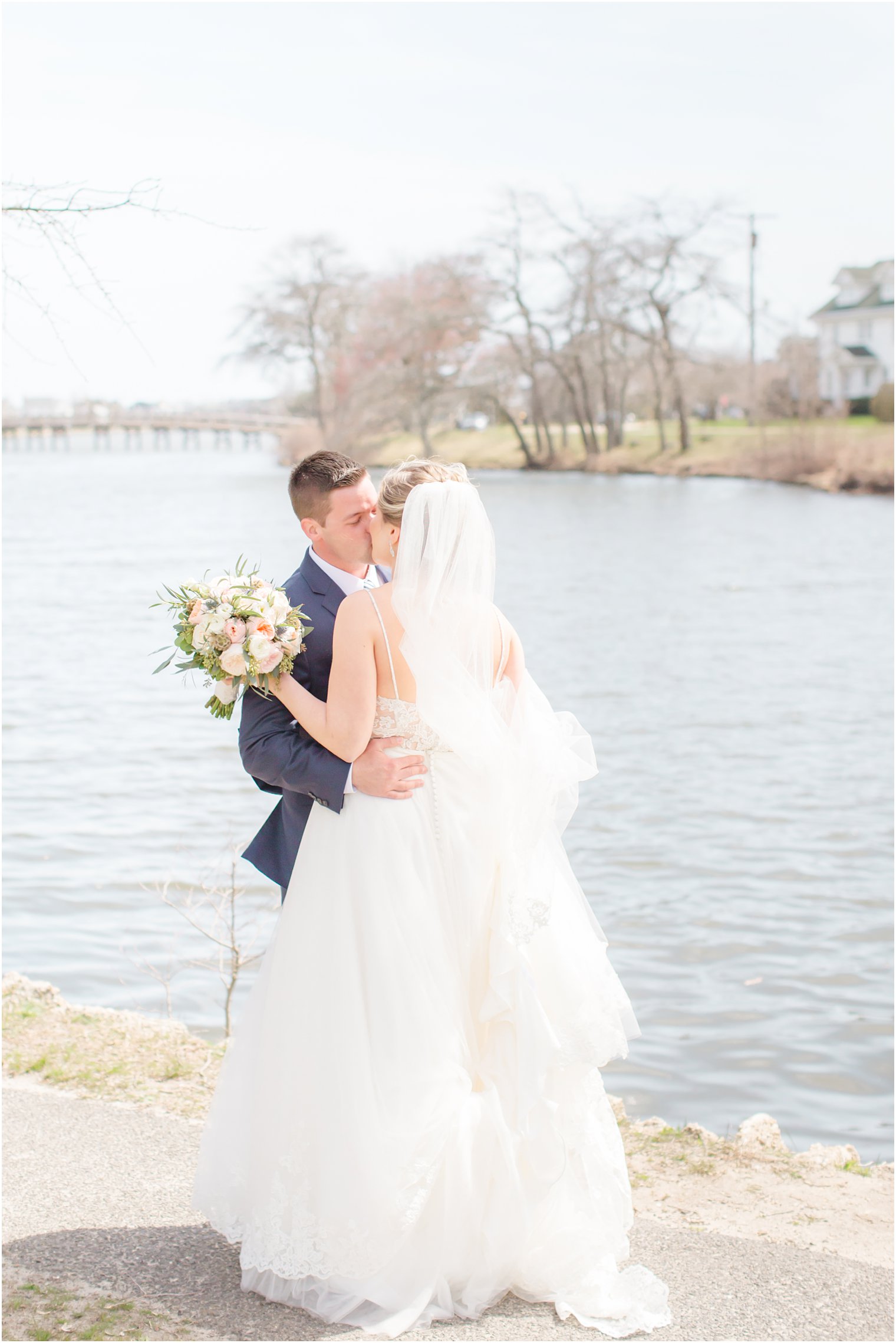 Bride and groom sharing a first look at Divine Park in Spring Lake 